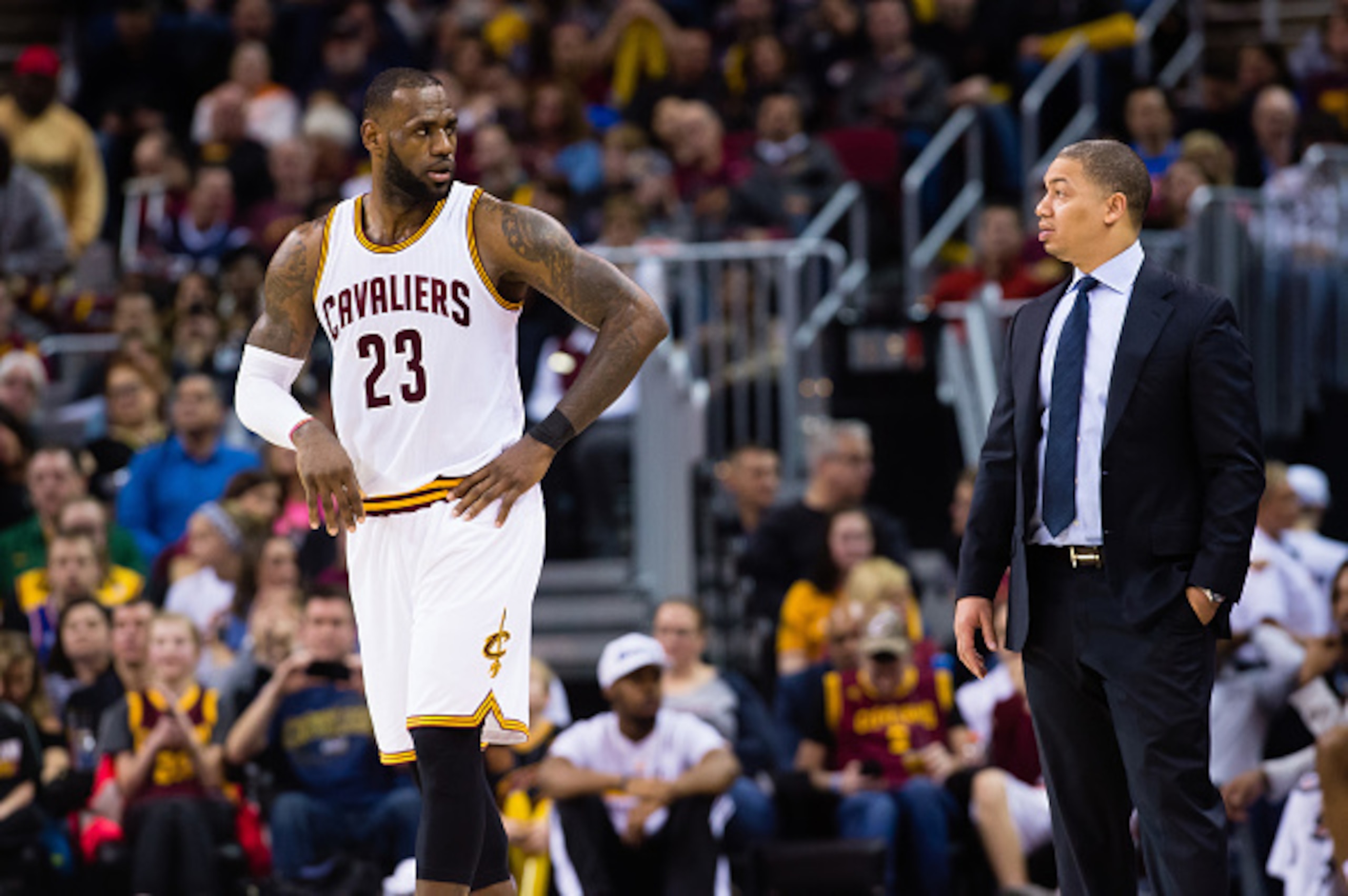 CLEVELAND, OH - FEBRUARY 11: LeBron James #23 talks with head coach Tyronn Lue of the Cleveland Cavaliers during the second half against the Denver Nuggets at Quicken Loans Arena on February 11, 2017 in Cleveland, Ohio. The Cavaliers defeated the Nuggets 