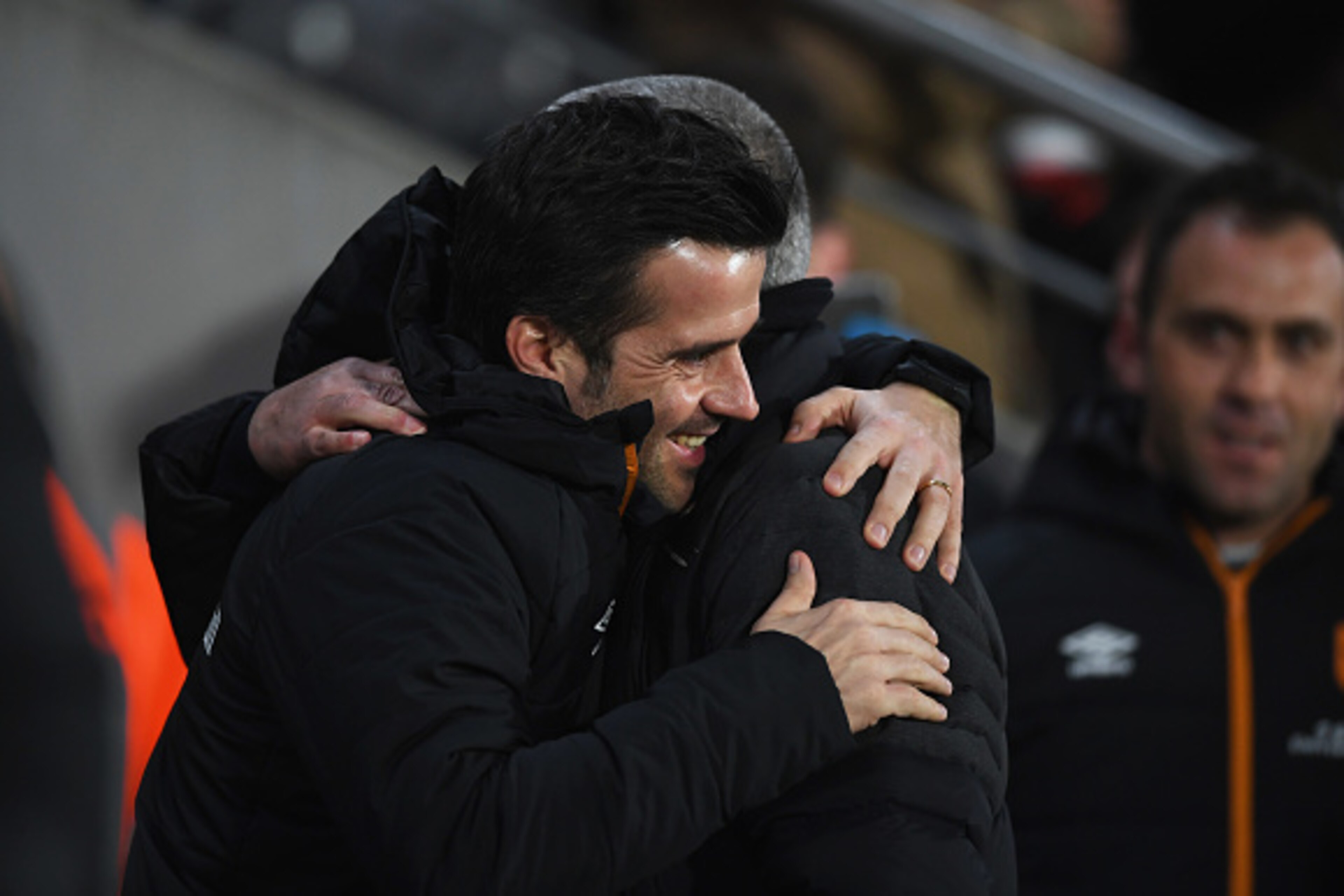 HULL, ENGLAND - JANUARY 26:  Marco Silva manager of Hull City and Jose Mourinho manager of Manchester United embrace the EFL Cup Semi-Final second leg match between Hull City and Manchester United at KCOM Stadium on January 26, 2017 in Hull, England.  (Ph