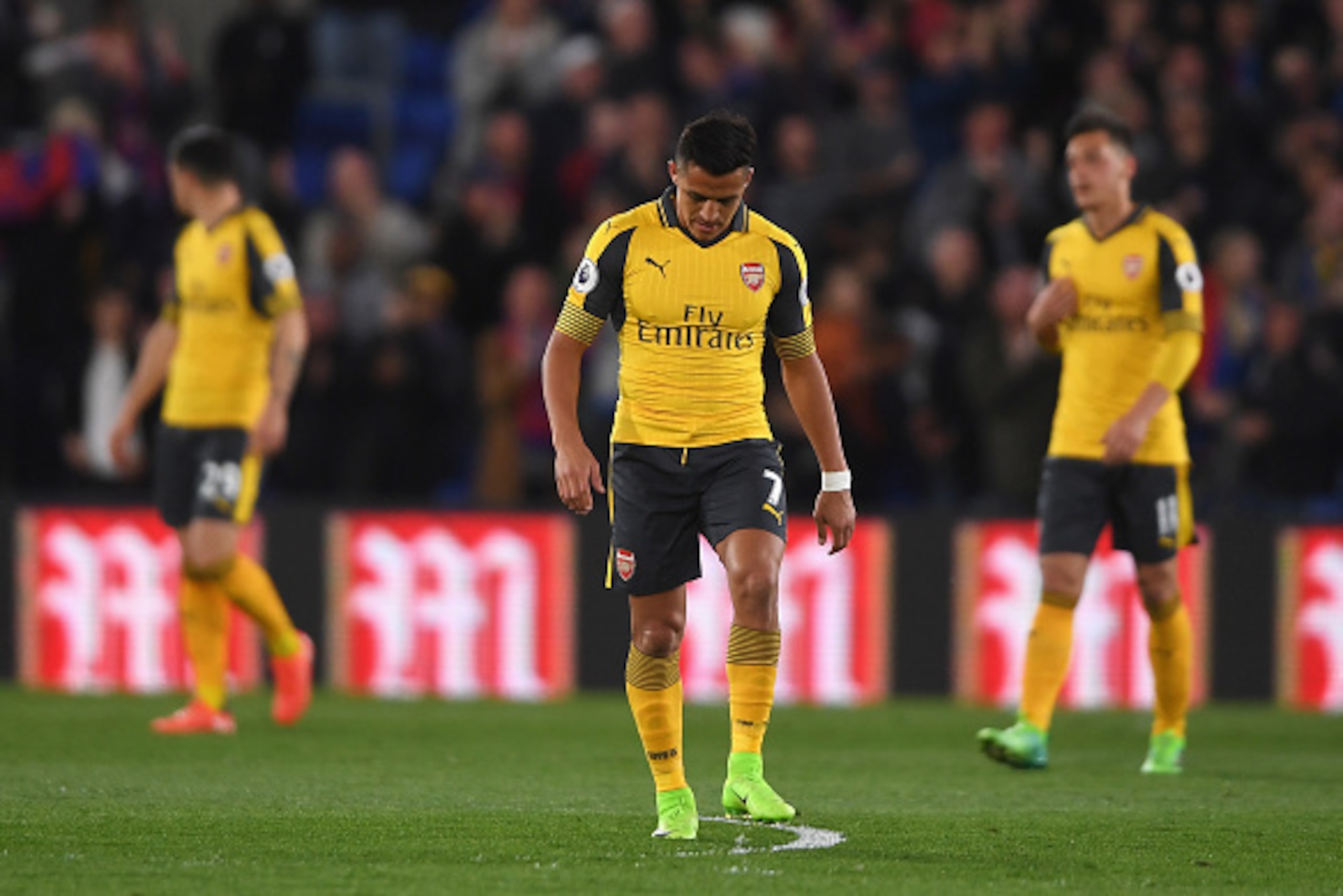 LONDON, ENGLAND - APRIL 10:  Alexis Sanchez of Arsenal (7) looks dejected as Andros Townsend of Crystal Palace scores their first goal during the Premier League match between Crystal Palace and Arsenal at Selhurst Park on April 10, 2017 in London, England