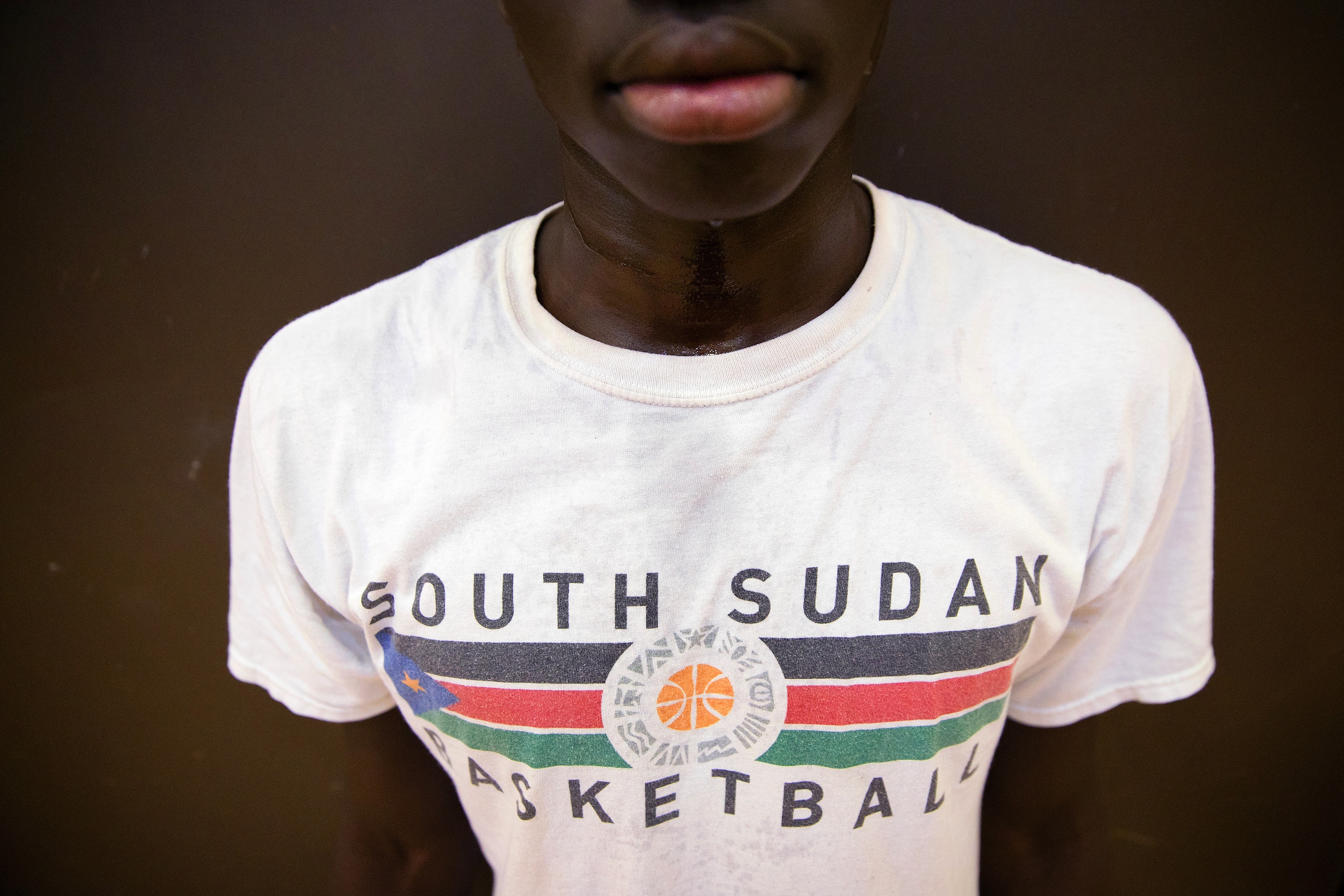 Khuath Gatkuoth wears a T-shirt reading "South Sudan Basketball" during a practice at Omaha North High Magnet School on North 36th Street on March 31, 2017, in Omaha, Nebraska.