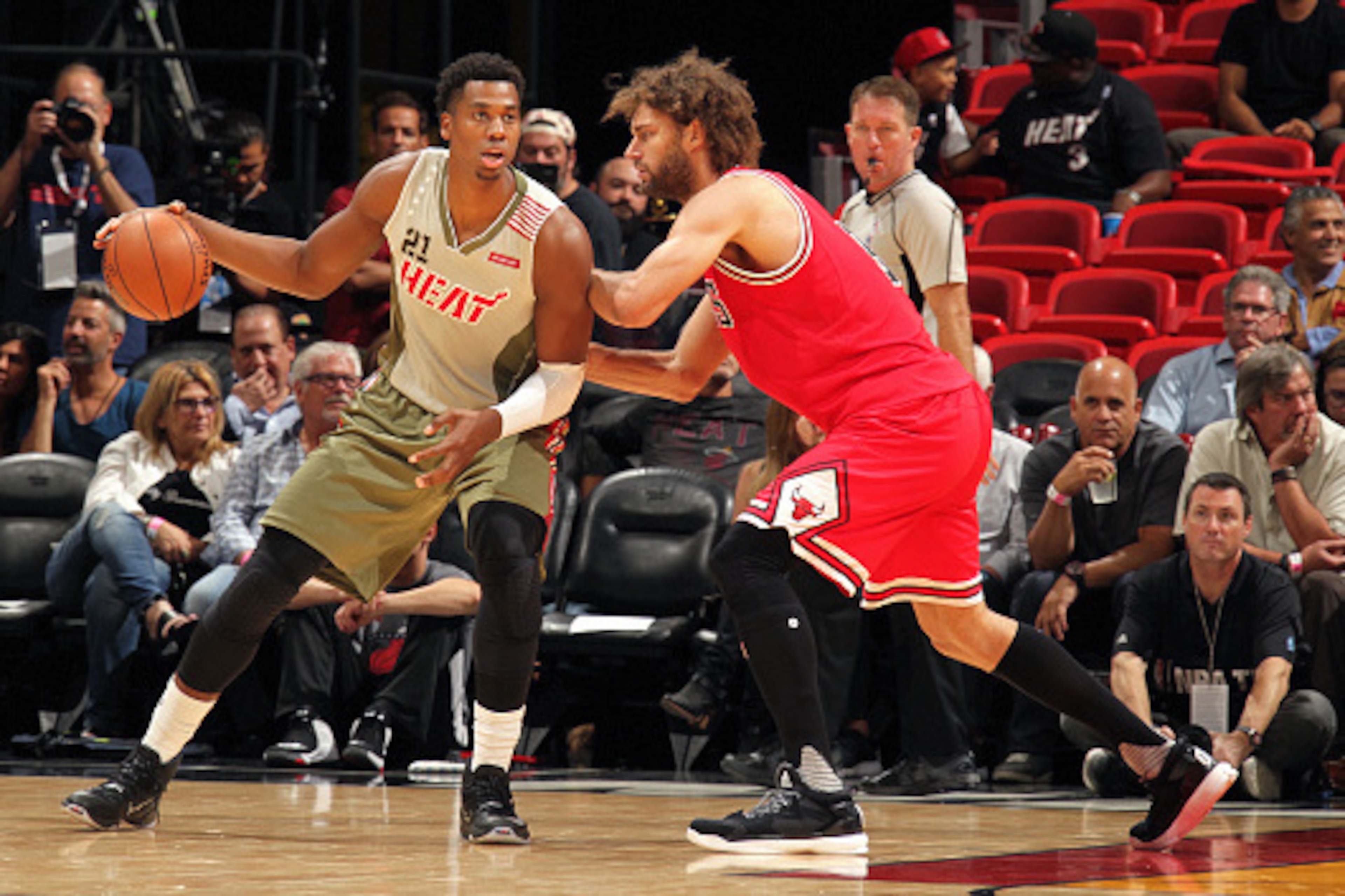MIAMI, FL - NOVEMBER 10: Hassan Whiteside #21 of the Miami Heat handles the ball during the game against the Chicago Bulls on November 10, 2016 at AmericanAirlines Arena in Miami, Florida. NOTE TO USER: User expressly acknowledges and agrees that, by down