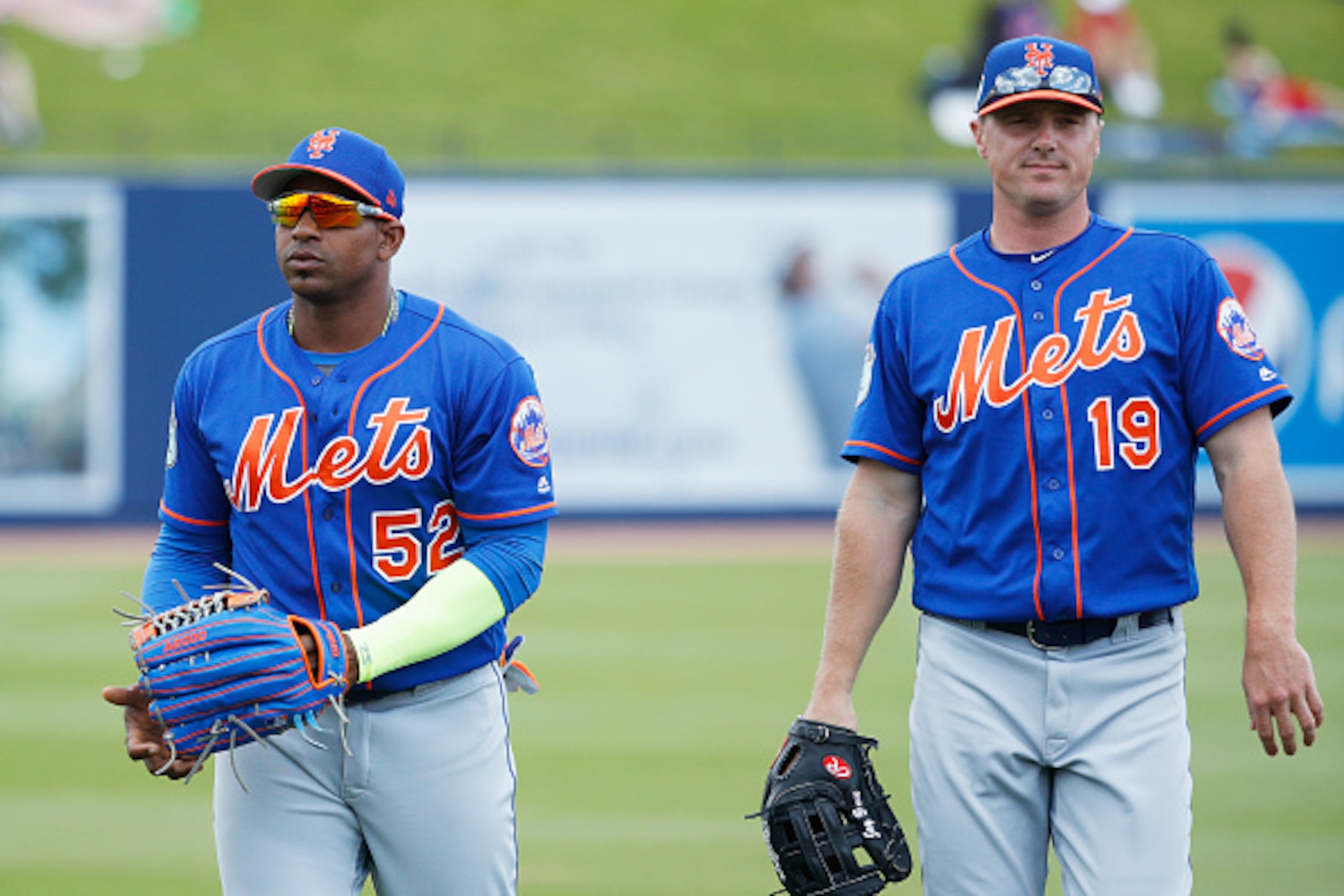WEST PALM BEACH, FL - MARCH 23: Yoenis Cespedes #52 and Jay Bruce #19 of the New York Mets look on during a Grapefruit League spring training game against the Washington Nationals at The Ballpark of the Palm Beaches on March 23, 2017 in West Palm Beach, F