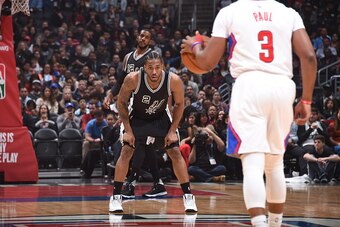 LOS ANGELES, CA - FEBRUARY 24: Kawhi Leonard #2 of the San Antonio Spurs plays defense against the LA Clippers on February 24, 2017 at STAPLES Center in Los Angeles, California. NOTE TO USER: User expressly acknowledges and agrees that, by downloading and