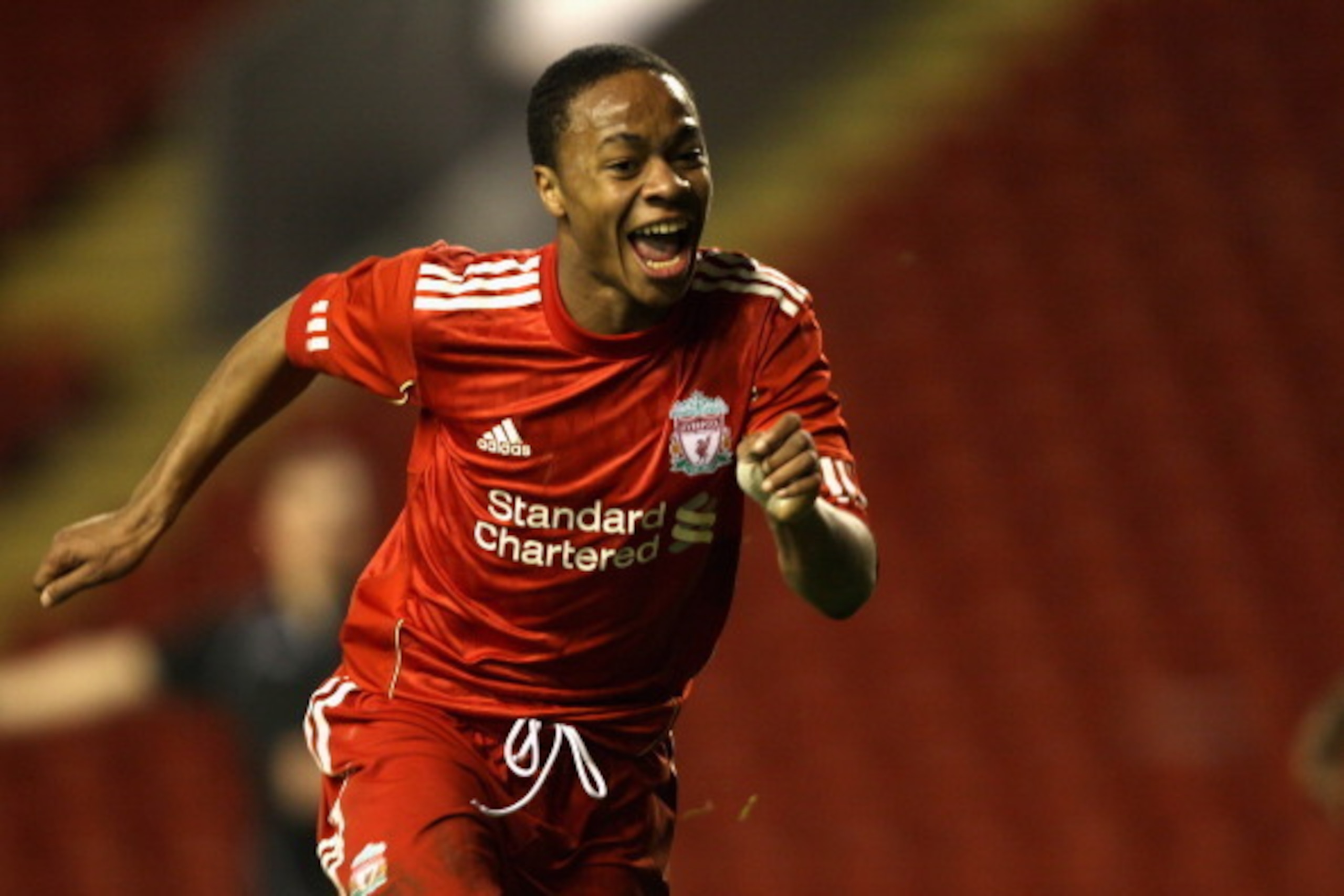 LIVERPOOL, ENGLAND - FEBRUARY 14:  Raheem Sterling of Liverpool celebrates after scoring his first goal during the FA Youth Cup match between Liverpool and Southend United at Anfield on February 14, 2011 in Liverpool, England.  (Photo by Clive Brunskill/G