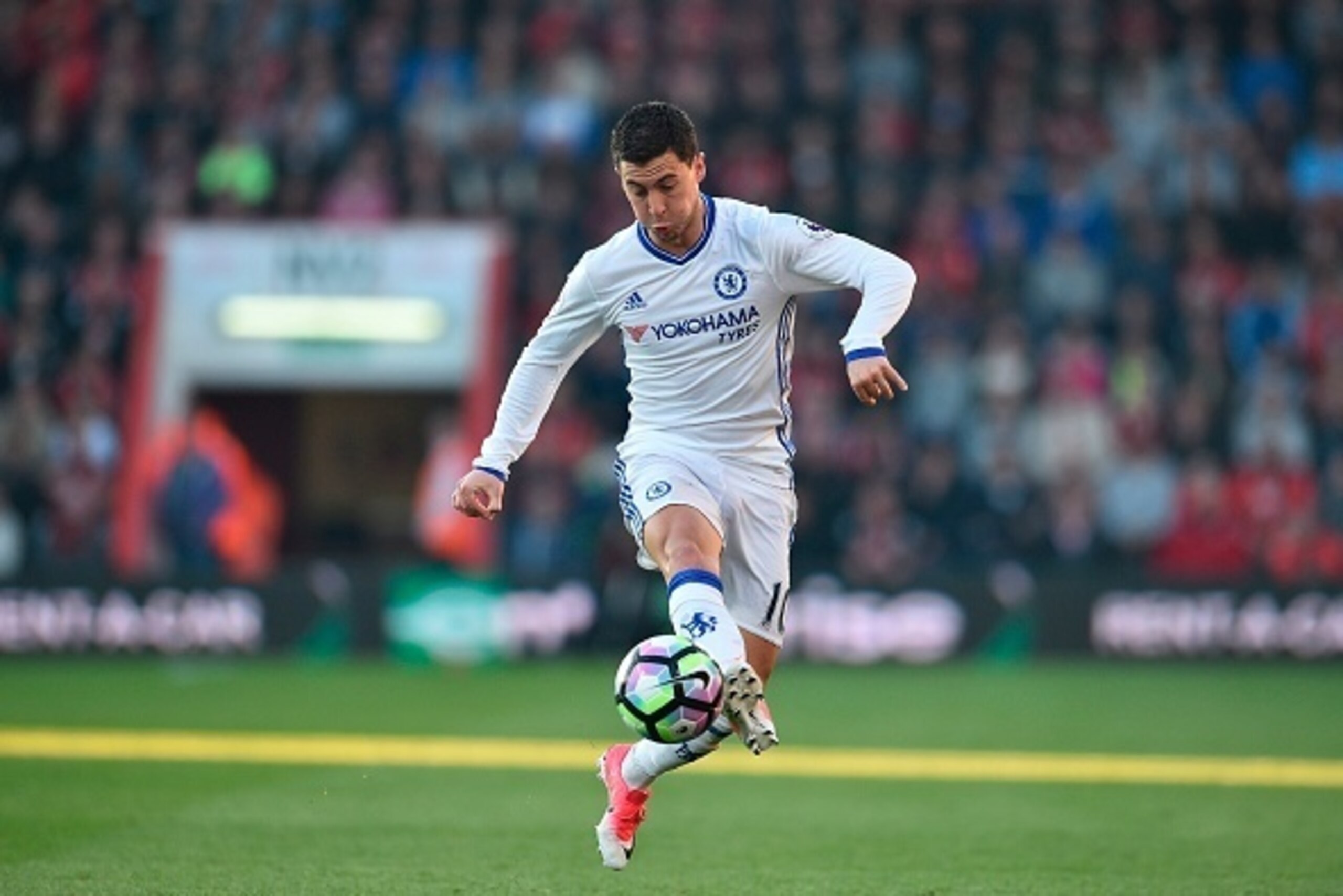 Chelsea's Belgian midfielder Eden Hazard chases the ball down during the English Premier League football match between Bournemouth and Chelsea at the Vitality Stadium in Bournemouth, southern England on April 8, 2017. / AFP PHOTO / Glyn KIRK / RESTRICTED 