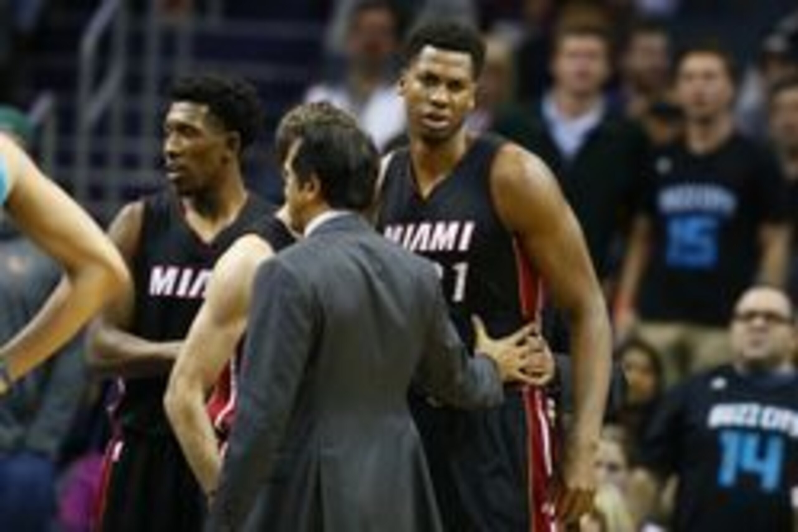 Apr 5, 2017; Charlotte, NC, USA; Miami Heat center Hassan Whiteside (21) gets separated from Charlotte Hornets center Cody Zeller (not pictured) after a scuffle in the second half at Spectrum Center. The Heat won 112-99. Mandatory Credit: Jeremy Brevard-U