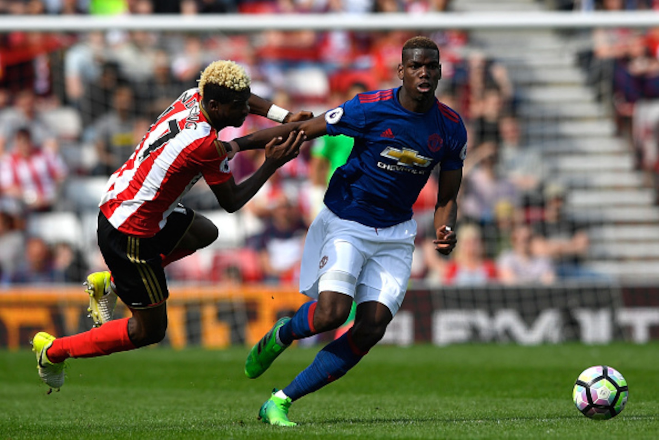 SUNDERLAND, ENGLAND - APRIL 09: Paul Pogba of Manchester United is challenged by Dider Ndong of Sunderland during the Premier League match between Sunderland and Manchester United at Stadium of Light on April 9, 2017 in Sunderland, England. (Photo by St SUNDERLAND, ENGLAND - APRIL 09: Paul Pogba of Manchester United is challenged by Dider Ndong of Sunderland during the Premier League match between Sunderland and Manchester United at Stadium of Light on April 9, 2017 in Sunderland, England. (Photo by St