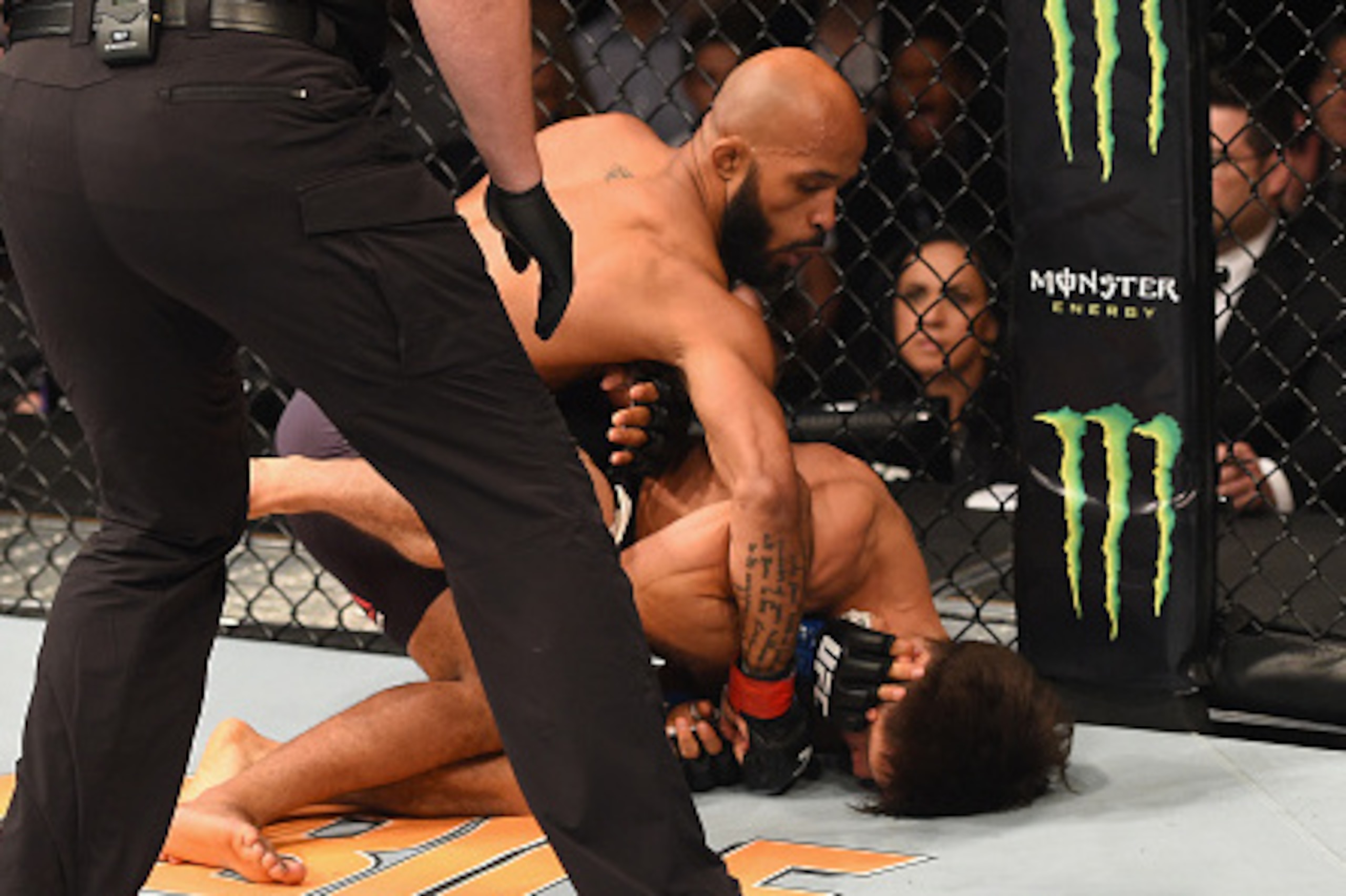 LAS VEGAS, NV - APRIL 23:  (L-R) Demetrious Johnson punches Henry Cejudo in their flyweight championship bout during the UFC 197 event inside MGM Grand Garden Arena on April 23, 2016 in Las Vegas, Nevada.  (Photo by Josh Hedges/Zuffa LLC/Zuffa LLC via Get