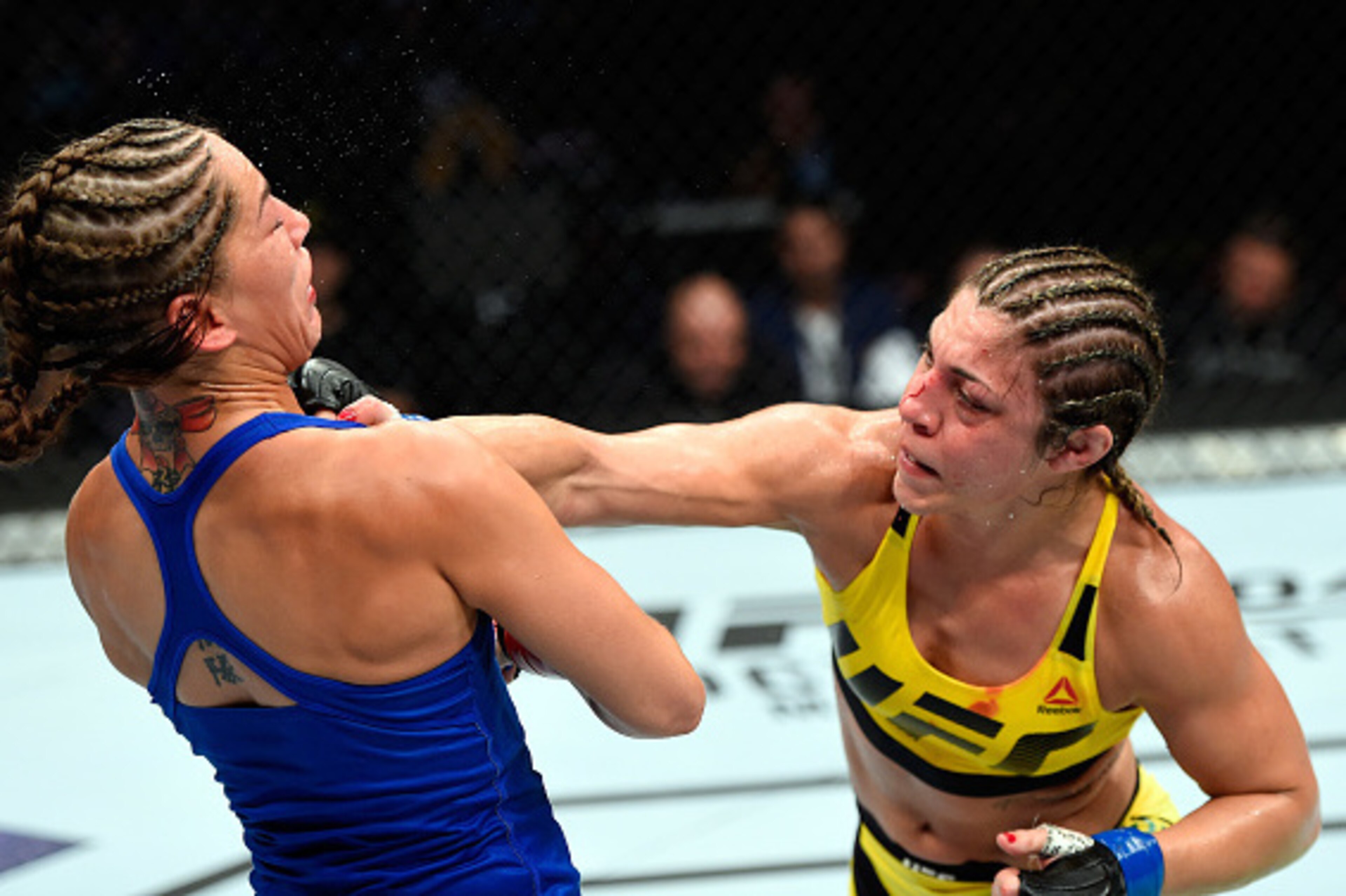 CLEVELAND, OH - SEPTEMBER 10:  (R-L) Bethe Correia of Brazil punches Jessica Eye in their women's bantamweight bout during the UFC 203 event at Quicken Loans Arena on September 10, 2016 in Cleveland, Ohio. (Photo by Josh Hedges/Zuffa LLC/Zuffa LLC via Get