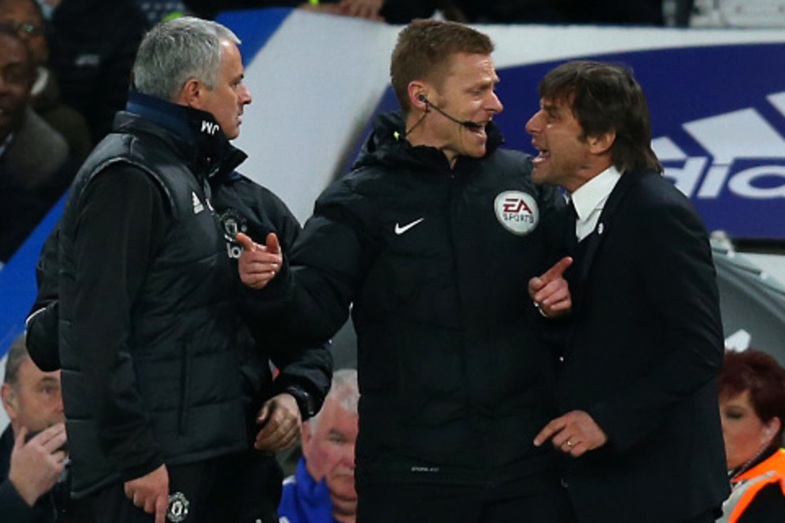 LONDON, ENGLAND - MARCH 13: Jose Mourinho Manager of Manchester United and Antonio Conte manager of Chelsea have words and are separated by fourth official Mike Jones during The Emirates FA Cup Quarter-Final match between Chelsea and Manchester United at LONDON, ENGLAND - MARCH 13: Jose Mourinho Manager of Manchester United and Antonio Conte manager of Chelsea have words and are separated by fourth official Mike Jones during The Emirates FA Cup Quarter-Final match between Chelsea and Manchester United at