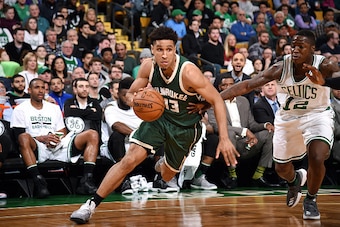 BOSTON, MA - MARCH 29: Malcolm Brogdon #13 of the Milwaukee Bucks handles the ball during the game against the Boston Celtics on March 29, 2017 at TD Garden in Boston, Massachusetts. NOTE TO USER: User expressly acknowledges and agrees that, by downloadin
