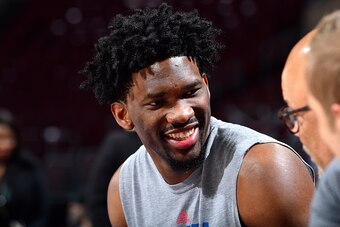 PHILADELPHIA, PA - FEBRUARY 11: Joel Embiid #21 of the Philadelphia 76ers talks with fans before the game against the Miami Heat on February 11, 2017 at Wells Fargo Center in Philadelphia, Pennsylvania. NOTE TO USER: User expressly acknowledges and agrees