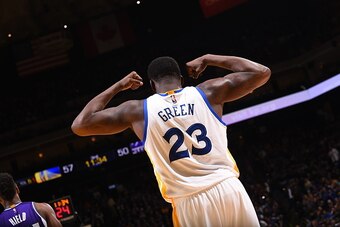 OAKLAND, CA - MARCH 24:  Draymond Green #23 of the Golden State Warriors flexes after scoring against the Sacramento Kings on March 24, 2017 at ORACLE Arena in Oakland, California. NOTE TO USER: User expressly acknowledges and agrees that, by downloading 