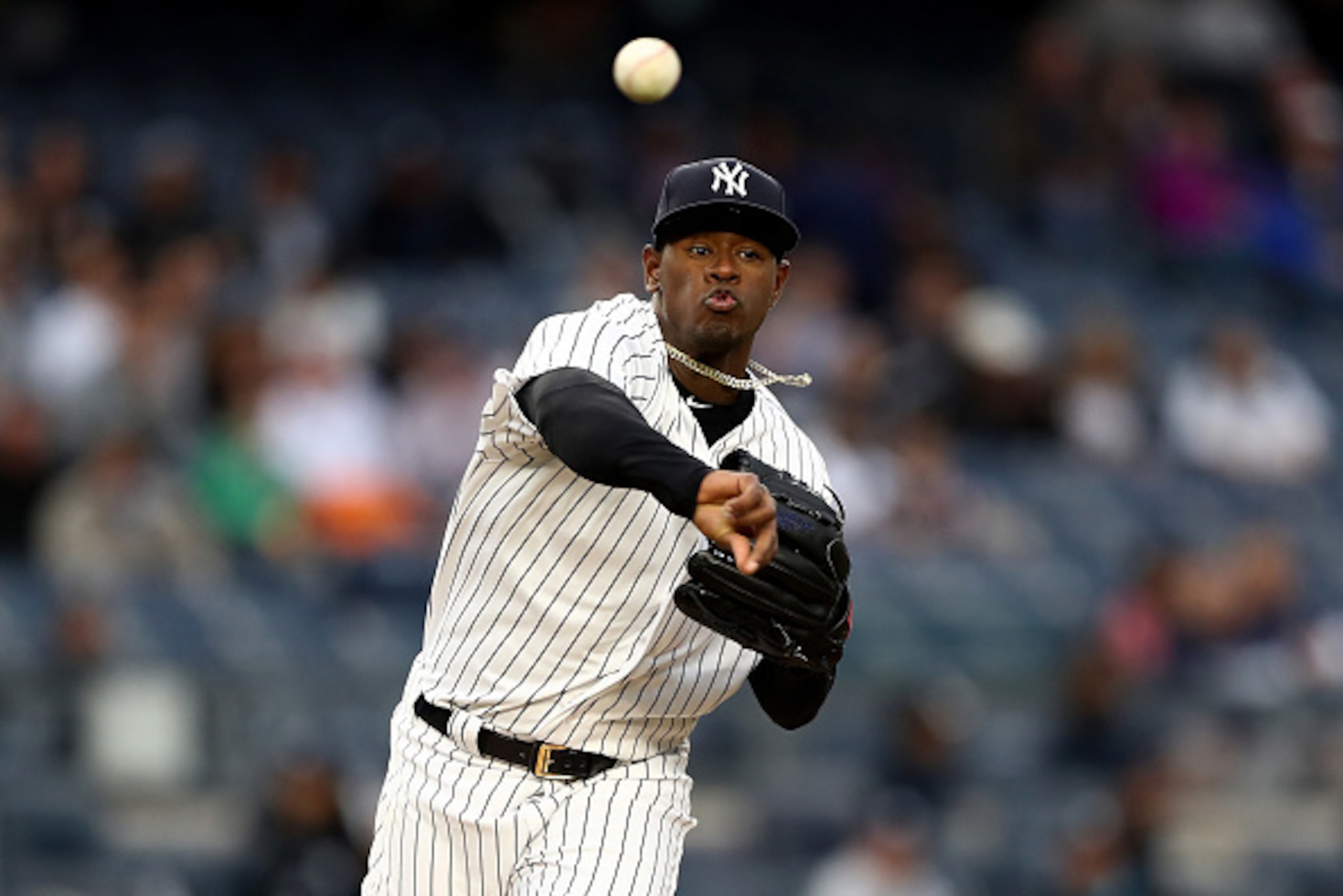NEW YORK, NY - APRIL 13:  Luis Severino #40 of the New York Yankees sends the ball back to first to try and pick off Kevin Kiermaier #39 of the Tampa Bay Rays in the first inning on April 13, 2017 at Yankee Stadium in the Bronx borough of New York City.  