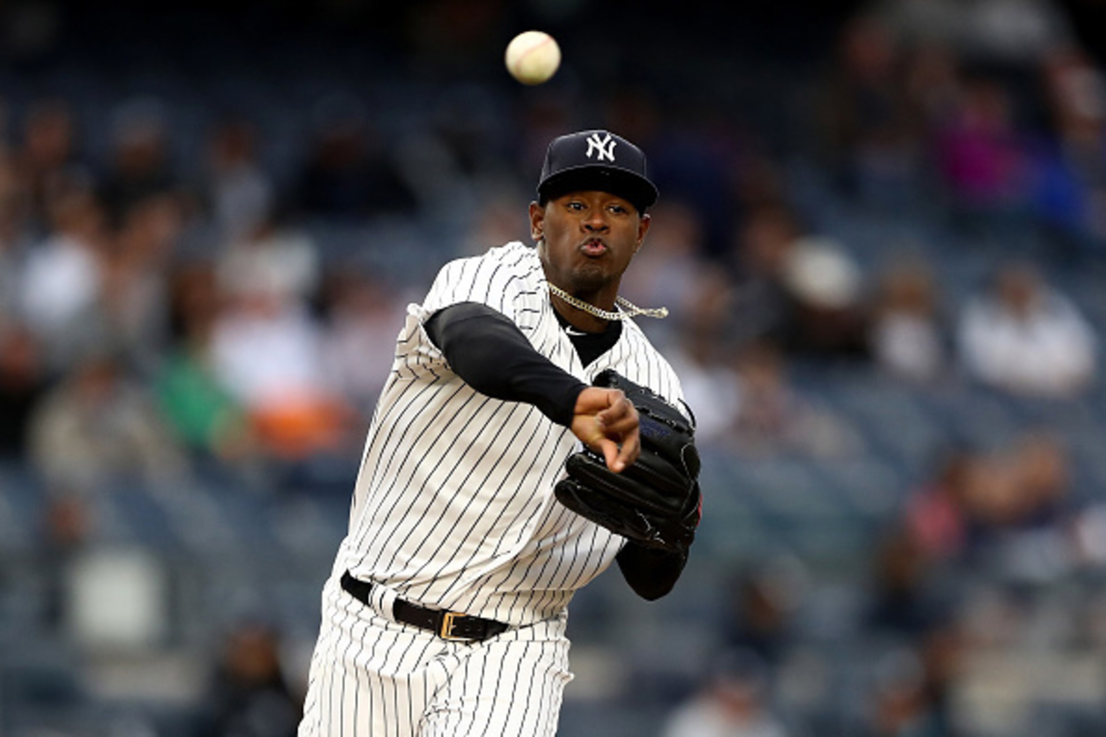 NEW YORK, NY - APRIL 13: Luis Severino #40 of the New York Yankees sends the ball back to first to try and pick off Kevin Kiermaier #39 of the Tampa Bay Rays in the first inning on April 13, 2017 at Yankee Stadium in the Bronx borough of New York City. NEW YORK, NY - APRIL 13: Luis Severino #40 of the New York Yankees sends the ball back to first to try and pick off Kevin Kiermaier #39 of the Tampa Bay Rays in the first inning on April 13, 2017 at Yankee Stadium in the Bronx borough of New York City.