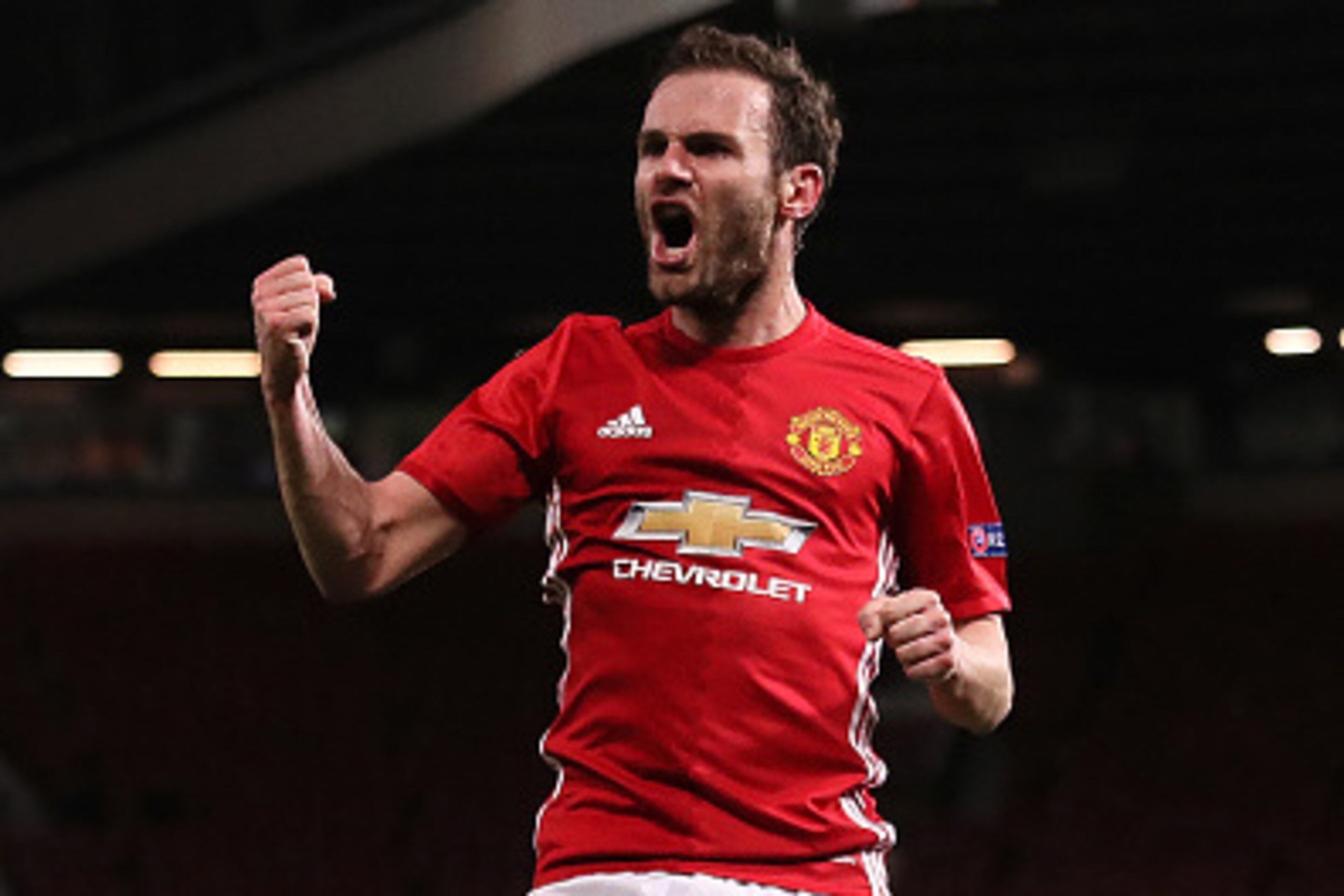 MANCHESTER, ENGLAND - MARCH 16:  Juan Mata of Manchester United celebrates scoring the first goal which made the score 1-0  during the UEFA Europa League Round of 16 second leg match between Manchester United and FK Rostov at Old Trafford on March 16, 201