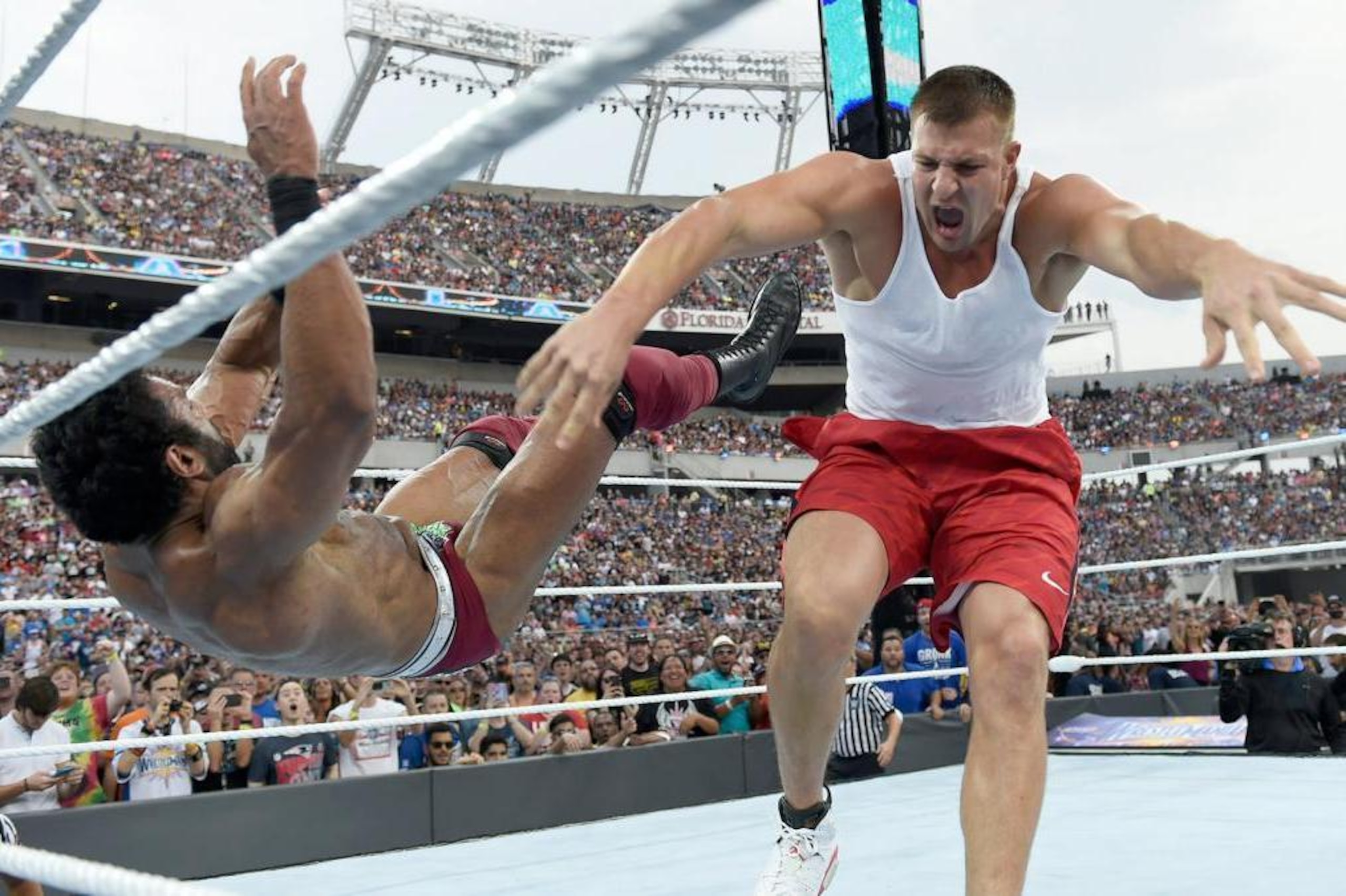 Rob Gronkowski takes down Jinder Mahal at WrestleMania 33. Rob Gronkowski takes down Jinder Mahal at WrestleMania 33.