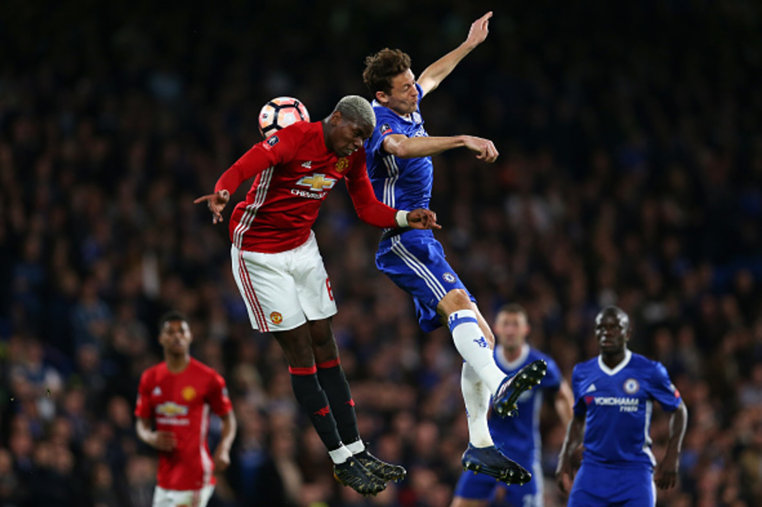 LONDON, ENGLAND - MARCH 13: Paul Pogba of Manchester United and Nemanja Matic of Chelsea during The Emirates FA Cup Quarter-Final match between Chelsea and Manchester United at Stamford Bridge on March 13, 2017 in London, England. (Photo by Catherine Ivil