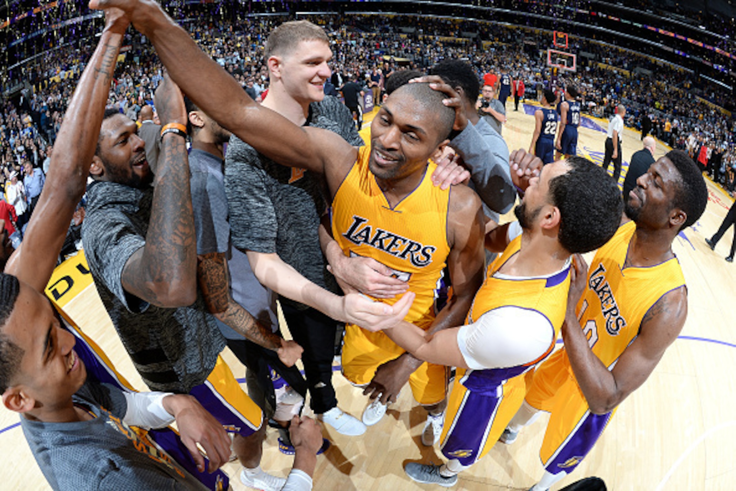 LOS ANGELES, CA - APRIL 11: Metta World Peace #37 of the Los Angeles Lakers celebrates with his teammates after the game against the New Orleans Pelicans on April 11, 2017 at STAPLES Center in Los Angeles, California. NOTE TO USER: User expressly acknowle