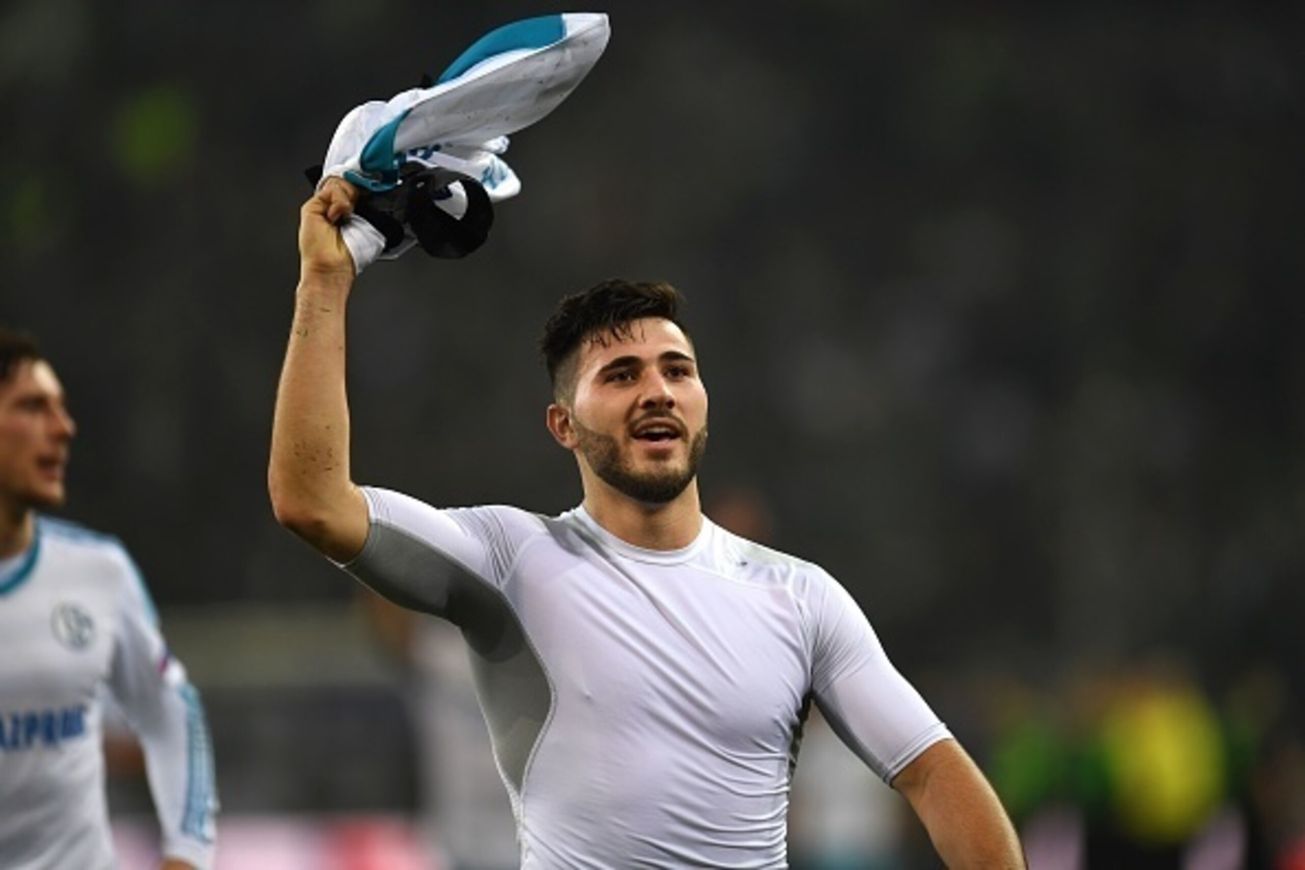 Schalke's defender Sead Kolasinac celebrates after the UEFA Europa League Round of 16, 2nd leg football match Borussia Moenchengladbach v FC Schalke 04 in Moenchengladbach, western Germany on March 16, 2017. / AFP PHOTO / PATRIK STOLLARZ        (Photo cre