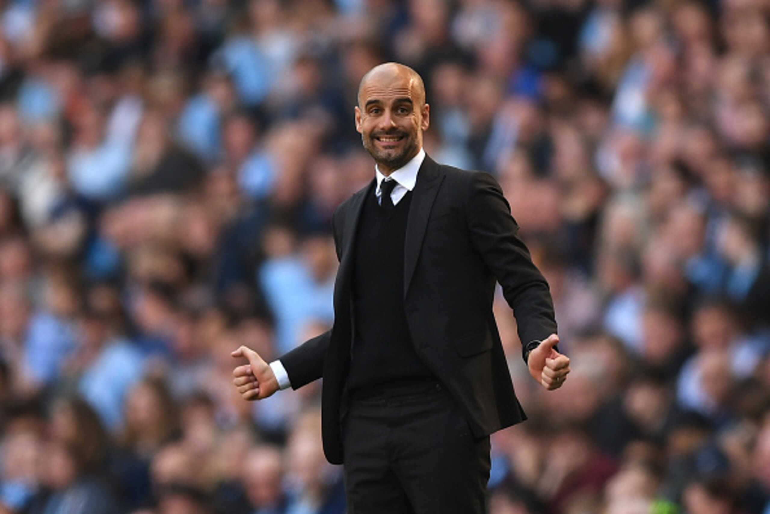 MANCHESTER, ENGLAND - APRIL 08: Josep Guardiola, Manager of Manchester City reacts during the Premier League match between Manchester City and Hull City at Etihad Stadium on April 8, 2017 in Manchester, England.  (Photo by Shaun Botterill/Getty Images)