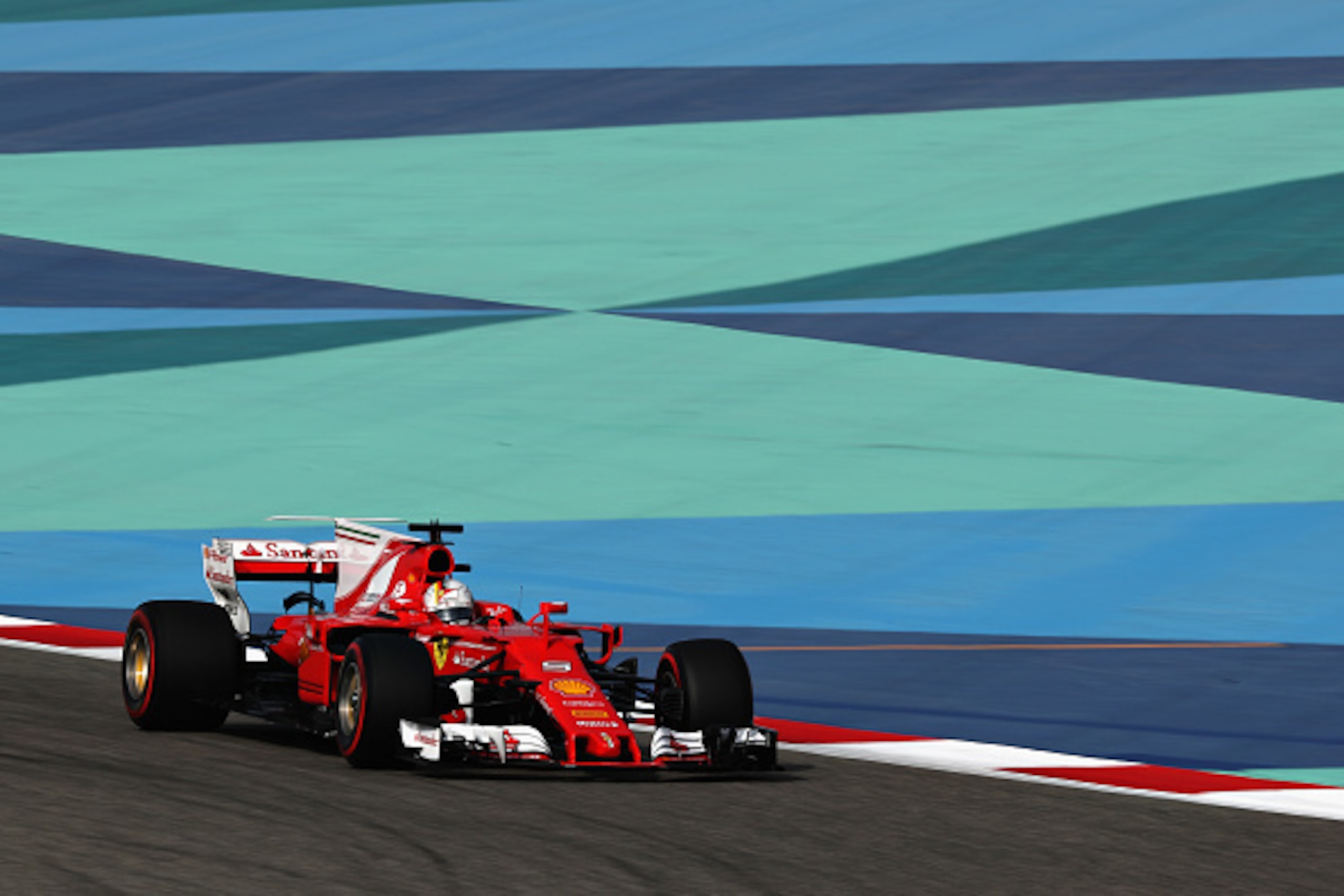 BAHRAIN, BAHRAIN - APRIL 15: Sebastian Vettel of Germany driving the (5) Scuderia Ferrari SF70H on track during final practice for the Bahrain Formula One Grand Prix at Bahrain International Circuit on April 15, 2017 in Bahrain, Bahrain.  (Photo by Lars B