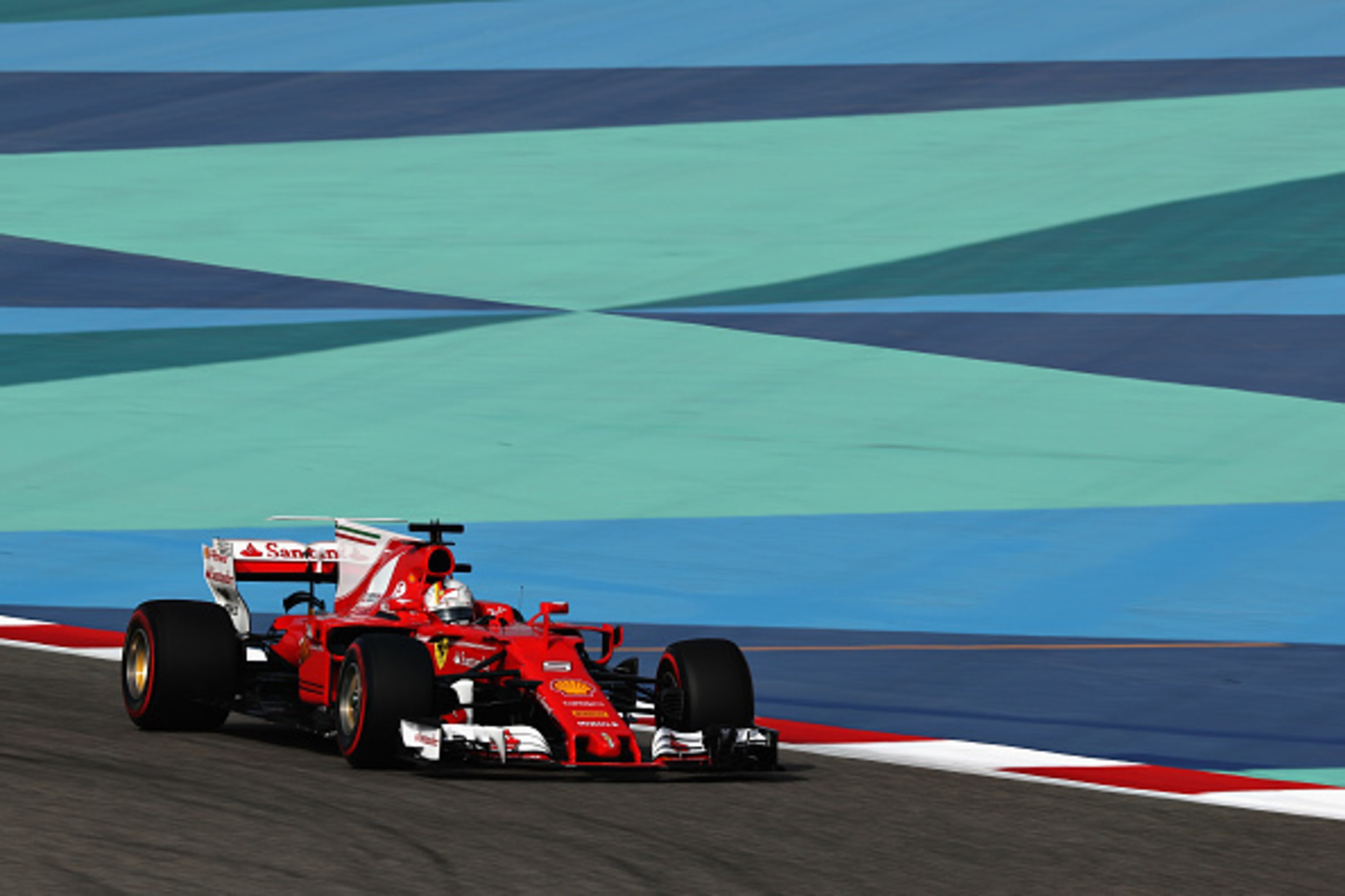 BAHRAIN, BAHRAIN - APRIL 15: Sebastian Vettel of Germany driving the (5) Scuderia Ferrari SF70H on track during final practice for the Bahrain Formula One Grand Prix at Bahrain International Circuit on April 15, 2017 in Bahrain, Bahrain. (Photo by Lars B BAHRAIN, BAHRAIN - APRIL 15: Sebastian Vettel of Germany driving the (5) Scuderia Ferrari SF70H on track during final practice for the Bahrain Formula One Grand Prix at Bahrain International Circuit on April 15, 2017 in Bahrain, Bahrain. (Photo by Lars B