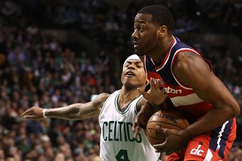 BOSTON, MA - MARCH 20: Isaiah Thomas #4 of the Boston Celtics defends John Wall #2 of the Washington Wizards during the second quarter at TD Garden on March 20, 2017 in Boston, Massachusetts. NOTE TO USER: User expressly acknowledges and agrees that, by d