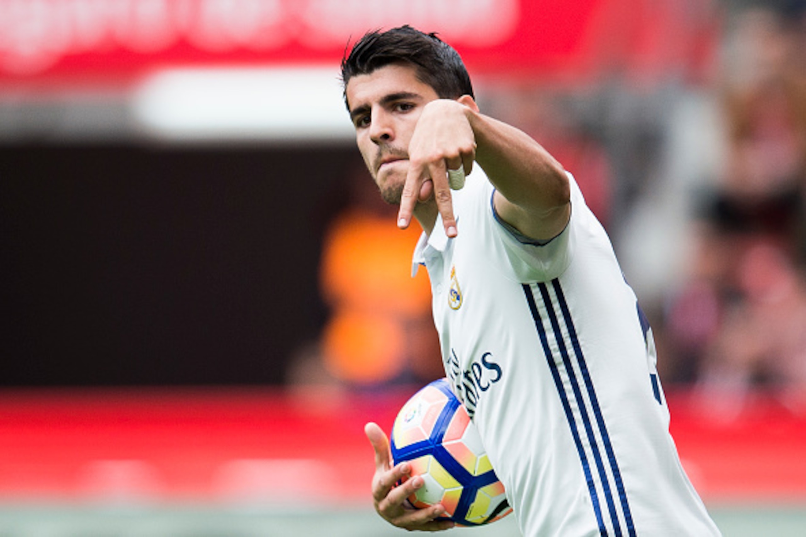 GIJON, SPAIN - APRIL 15:  Alvaro Morata of Real Madrid celebrates after scoring his team's second goal during the La Liga match between Real Sporting de Gijon and Real Madrid at Estadio El Molinon on April 15, 2017 in Gijon, Spain.  (Photo by Juan Manuel 