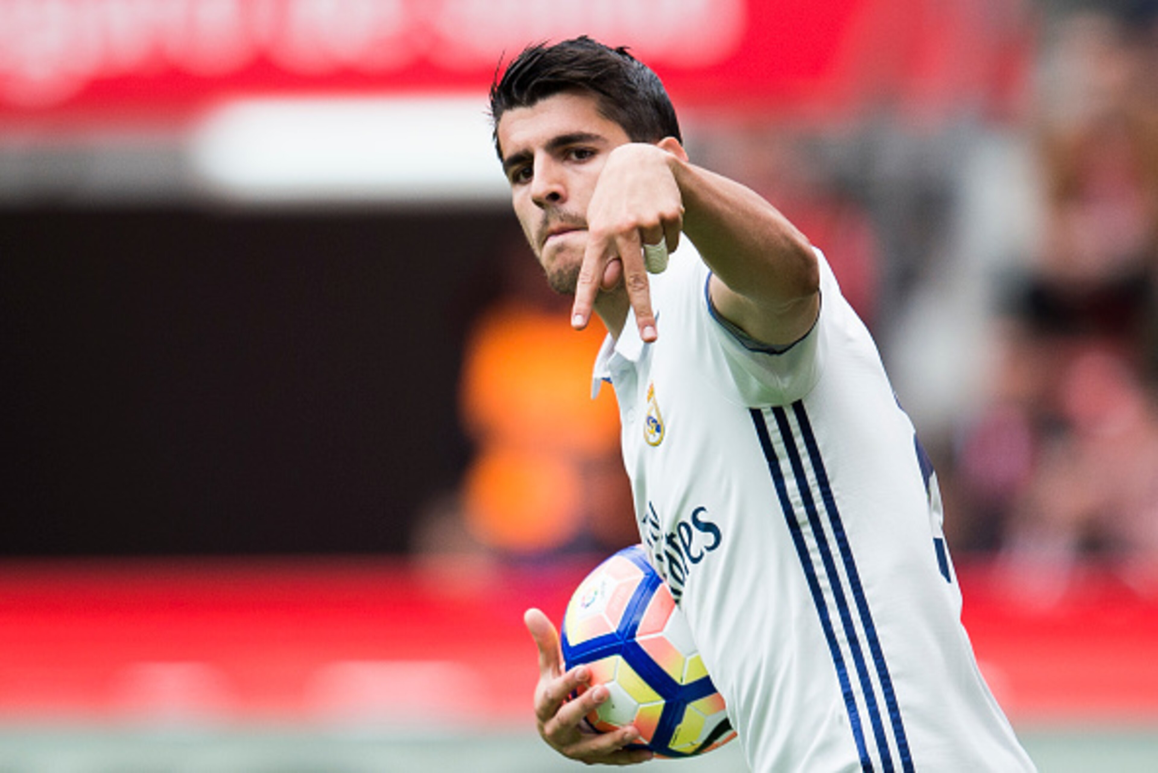 GIJON, SPAIN - APRIL 15:  Alvaro Morata of Real Madrid celebrates after scoring his team's second goal during the La Liga match between Real Sporting de Gijon and Real Madrid at Estadio El Molinon on April 15, 2017 in Gijon, Spain.  (Photo by Juan Manuel 
