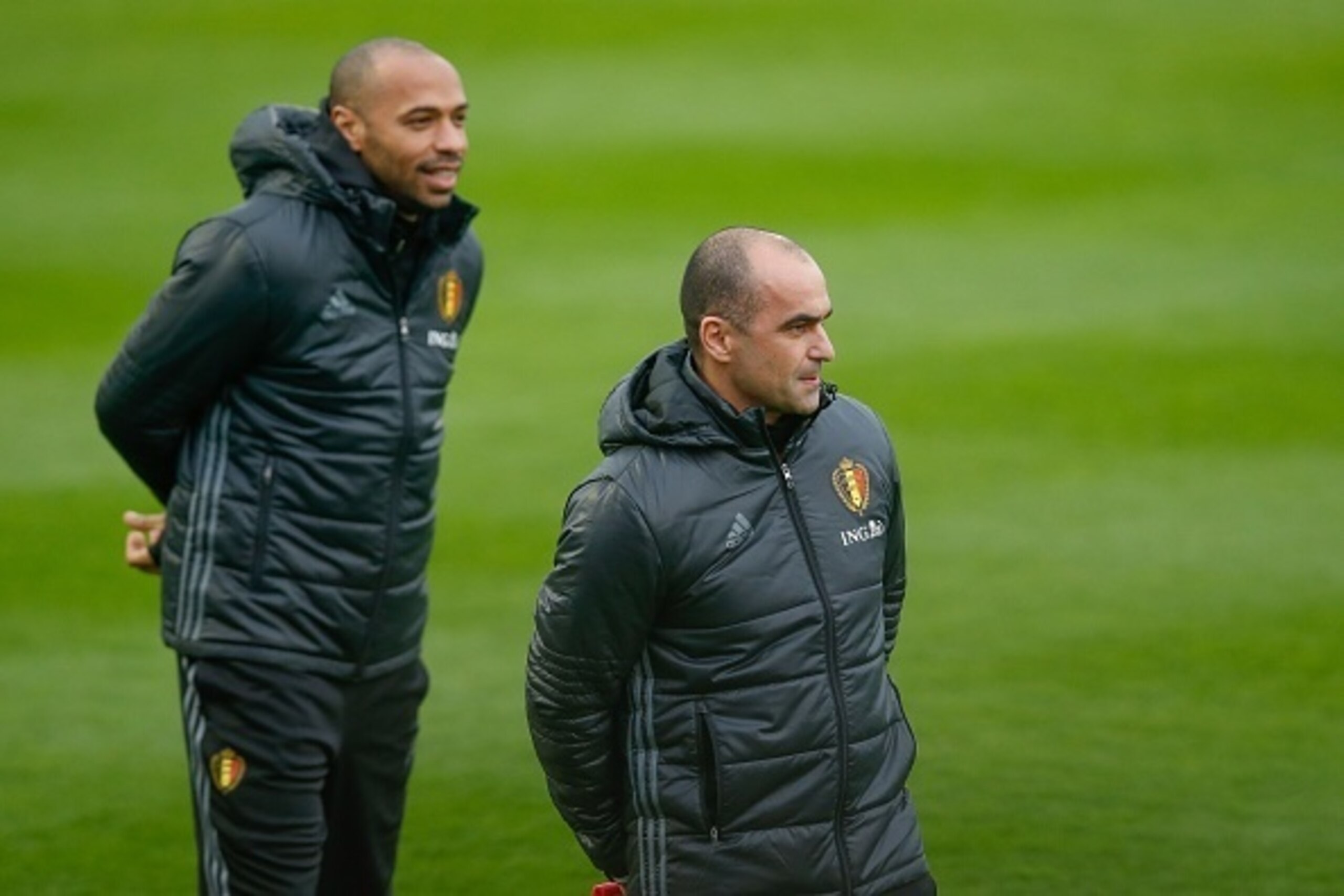 Belgium's assistant coach Thierry Henry and Belgium's head coach Roberto Martinez attend a training session of Belgian national soccer team Red Devils on March 20, 2017, at the Belgian Football Center in Tubize. 
On March 25, Belgium play a game against G