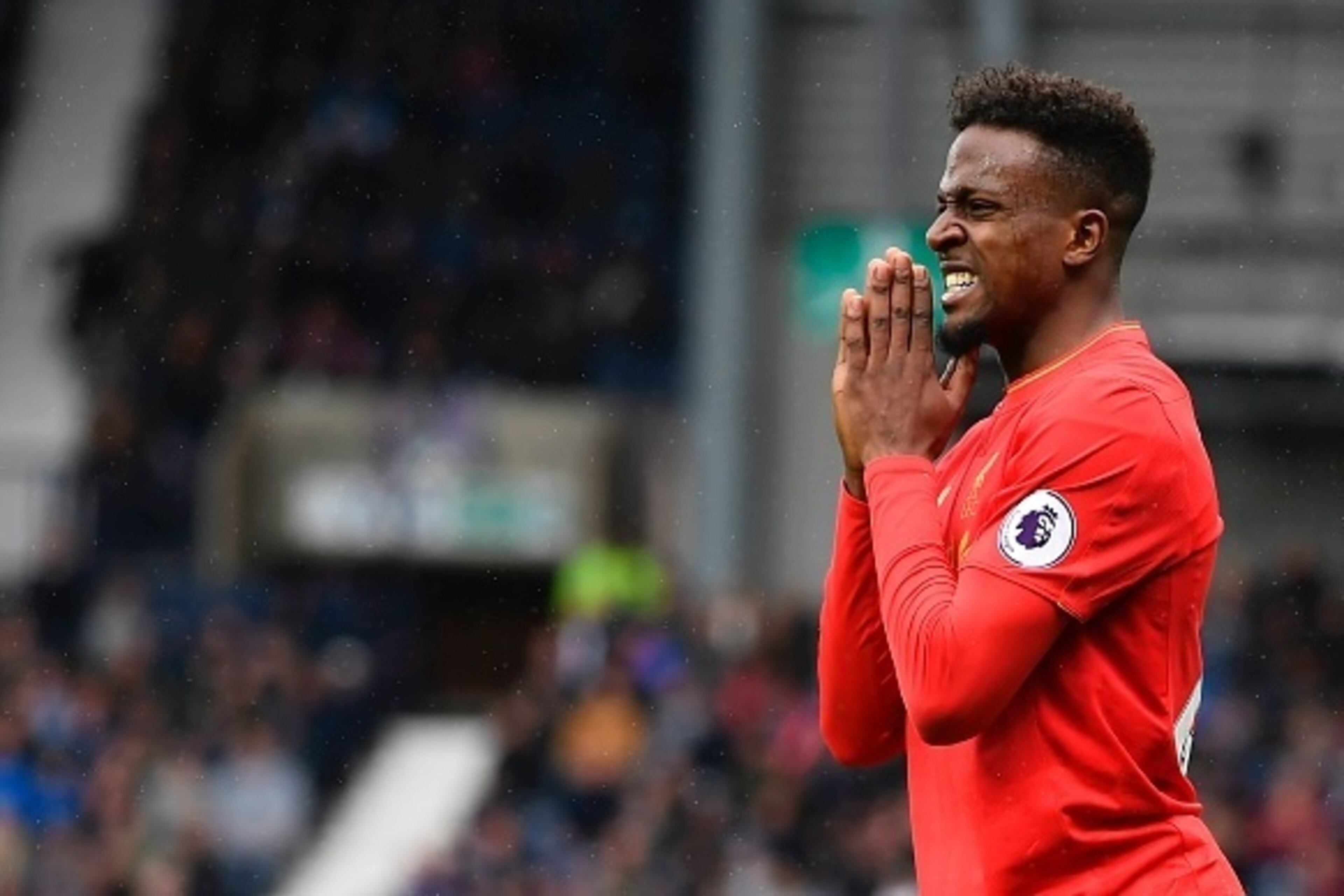 Liverpool's Belgian striker Divock Origi gestures during the English Premier League football match between West Bromwich Albion and Liverpool at The Hawthorns stadium in West Bromwich, central England, on April 16, 2017.
 / AFP PHOTO / Justin TALLIS / RES