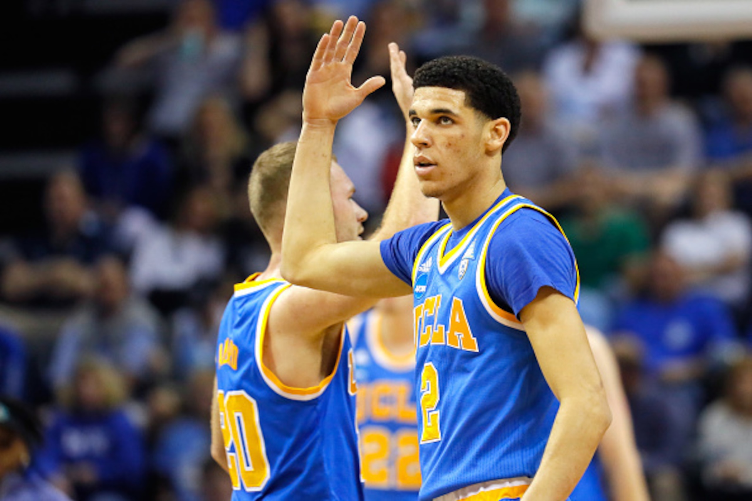 MEMPHIS, TN - MARCH 24: Lonzo Ball #2 of the UCLA Bruins celebrates with teammates after a play in the first half against the Kentucky Wildcats during the 2017 NCAA Men's Basketball Tournament South Regional at FedExForum on March 24, 2017 in Memphis, Ten