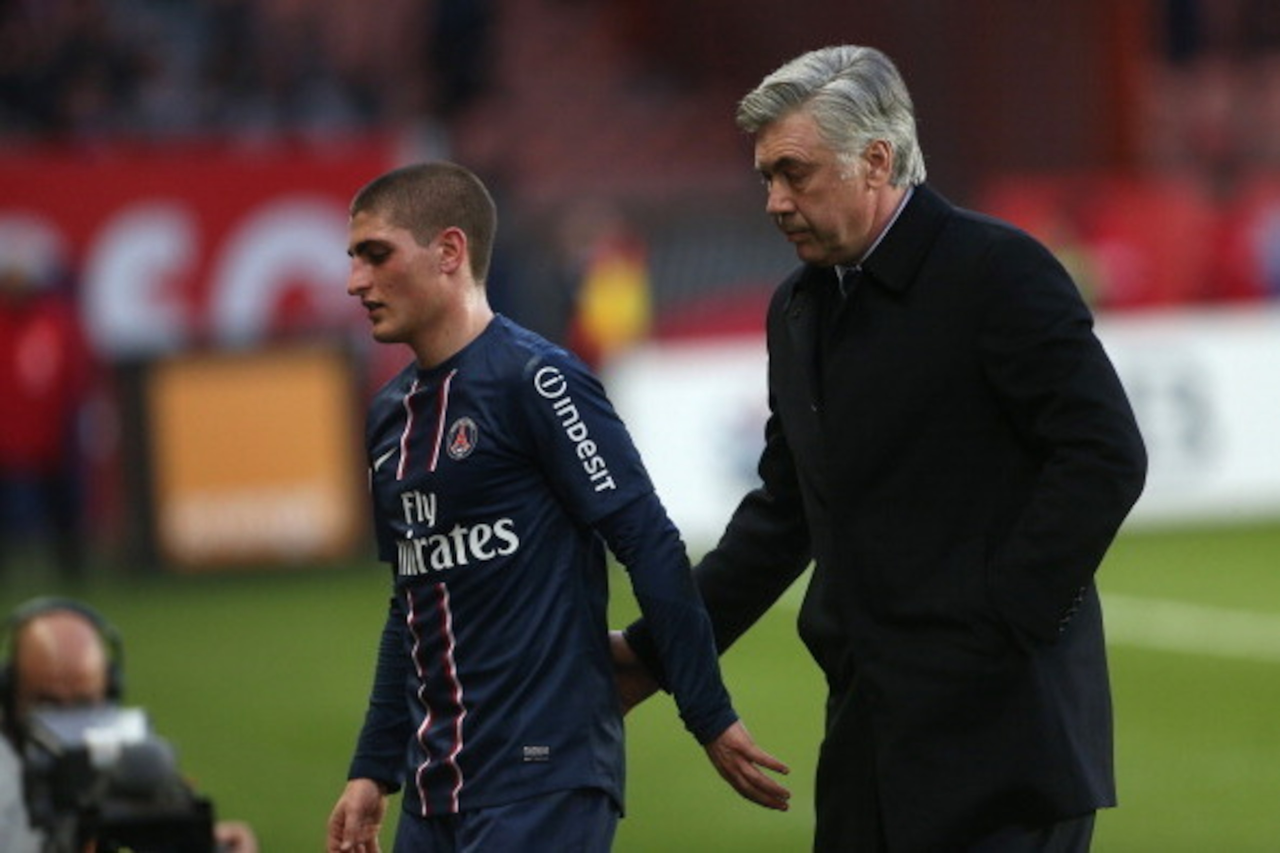PARIS, FRANCE - MARCH 9: Marco Verratti and Carlo Ancelotti, coach of PSG during the french Ligue 1 match between Paris Saint-Germain FC and AS Nancy-Lorraine ASNL at the Parc des Princes stadium on March 9, 2013 in Paris, France. (Photo by John Berry/Get PARIS, FRANCE - MARCH 9: Marco Verratti and Carlo Ancelotti, coach of PSG during the french Ligue 1 match between Paris Saint-Germain FC and AS Nancy-Lorraine ASNL at the Parc des Princes stadium on March 9, 2013 in Paris, France. (Photo by John Berry/Get