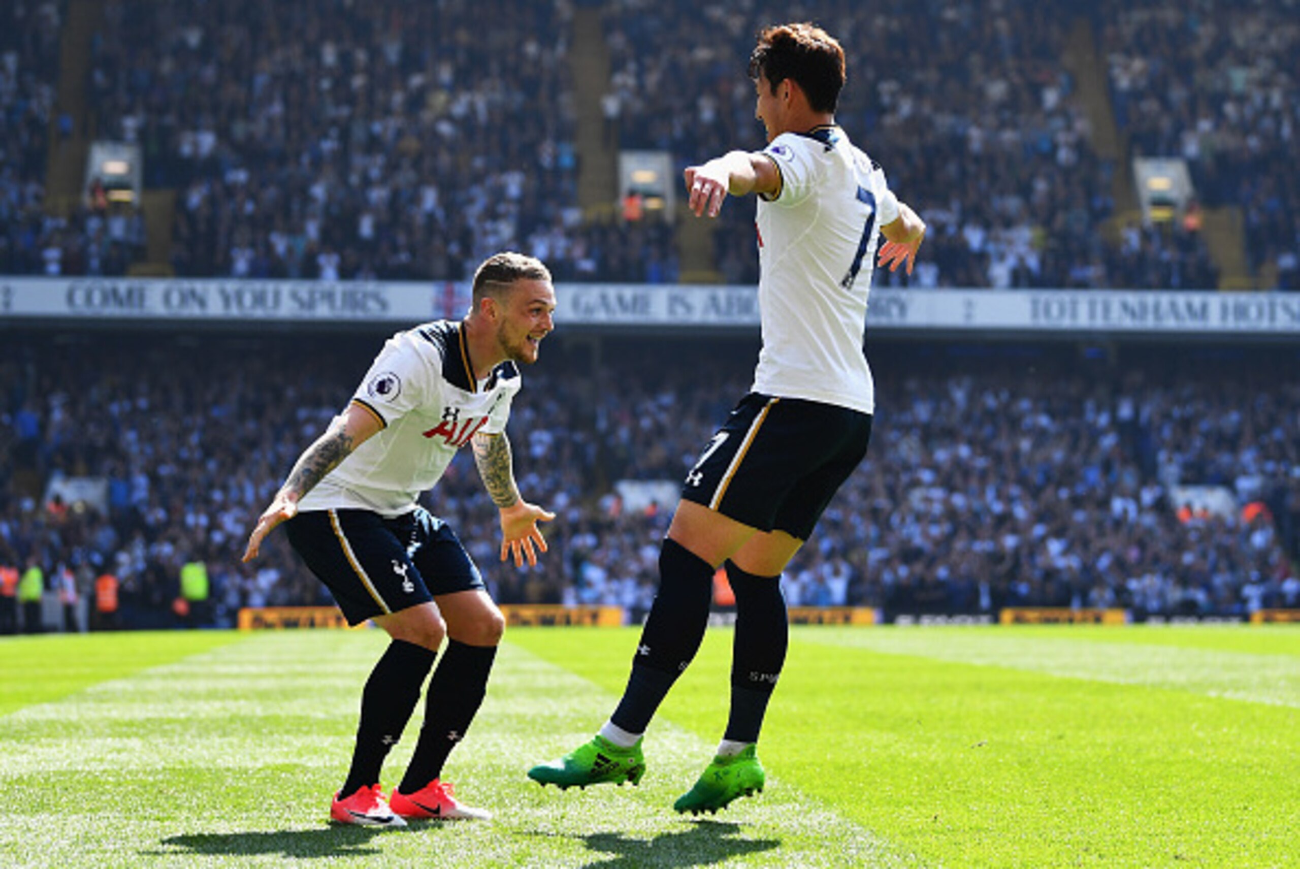 LONDON, ENGLAND - APRIL 08: Heung-Min Son of Tottenham Hotspur (R) celebrates scoring his sides fourth goal with Kieran Trippier of Tottenham Hotspur (L) during the Premier League match between Tottenham Hotspur and Watford at White Hart Lane on April 8, 