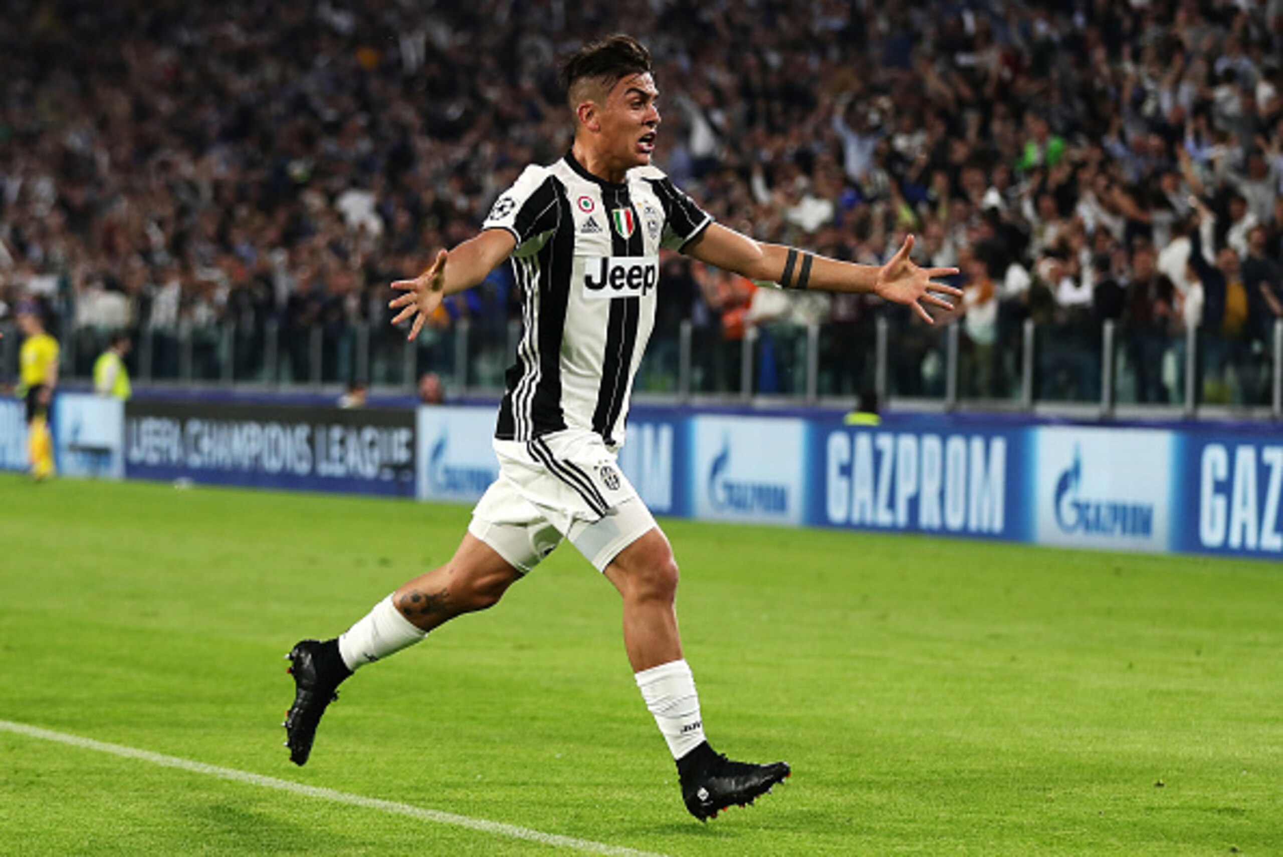 TURIN, ITALY - APRIL 11:  Paulo Dybala of Juventus celebrates scoring the second goal to make the score 2-0  during the UEFA Champions League Quarter Final first leg match between Juventus and FC Barcelona at Juventus Stadium on April 11, 2017 in Turin, I