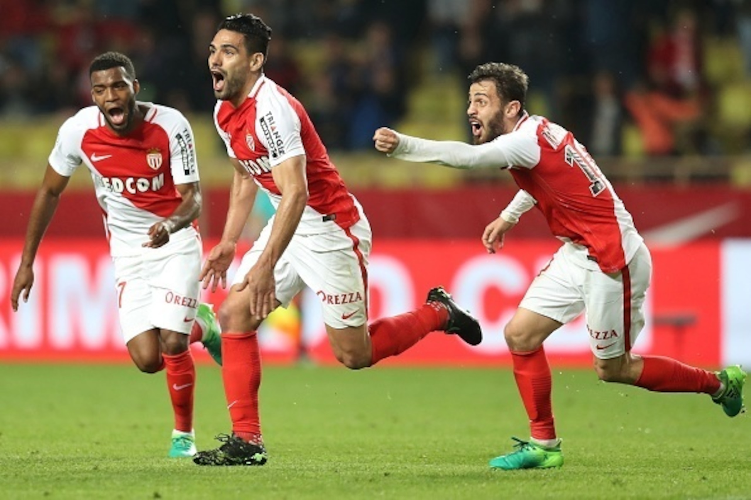 Monaco's Colombian forward Radamel Falcao (C) celebrates after scoring a goal during the French L1 football match Monaco (ASM) vs Dijon (DFCO) on April 15, 2017 at the Louis II Stadium in Monaco. / AFP PHOTO / VALERY HACHE        (Photo credit should read