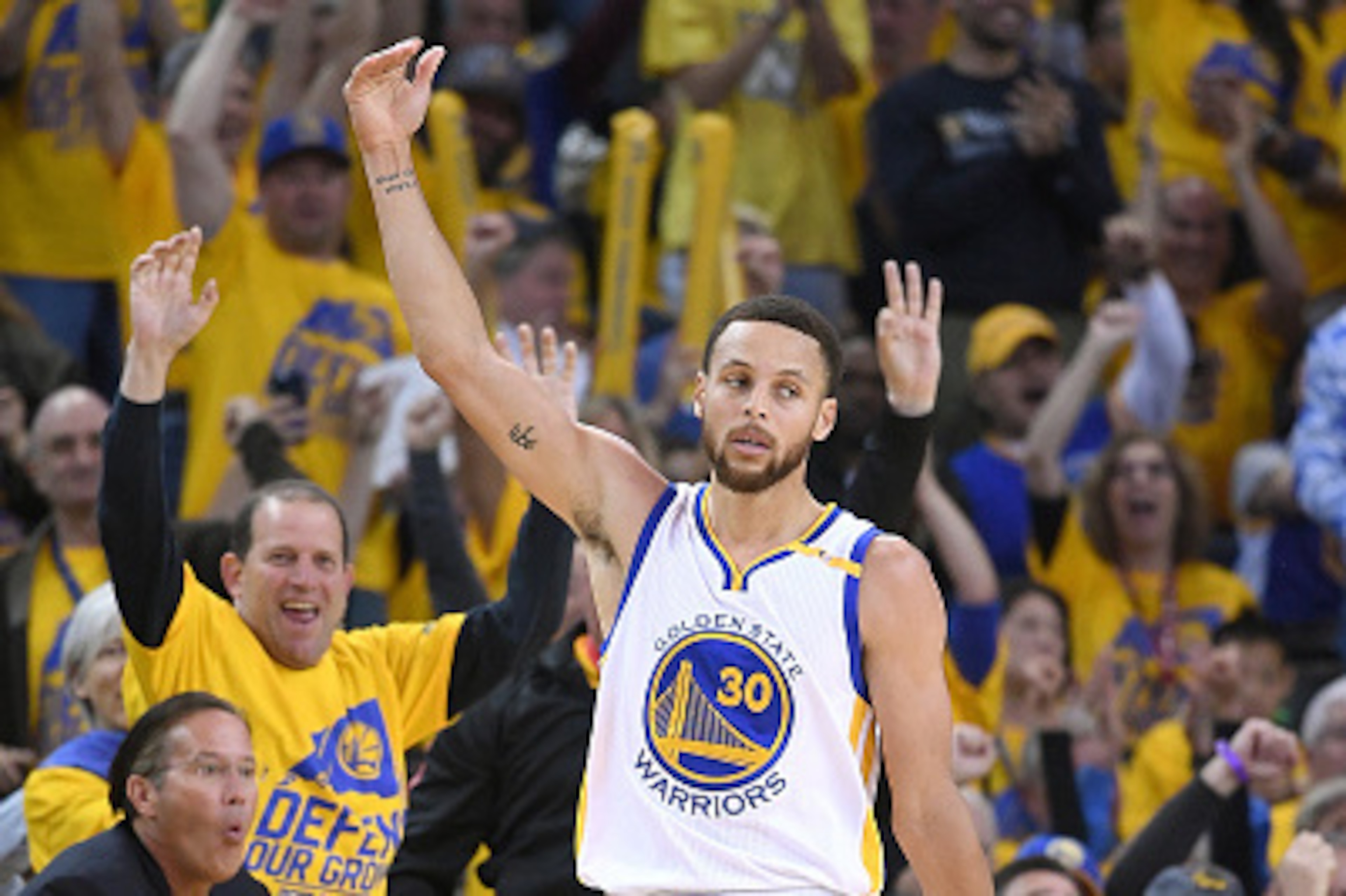 OAKLAND, CA - APRIL 16:  Stephen Curry #30 of the Golden State Warriors reacts after making a three-point shot over Maurice Harkless #4 of the Portland Trail Blazers in the third quarter during Game One of the first round of the 2017 NBA Playoffs at ORACL