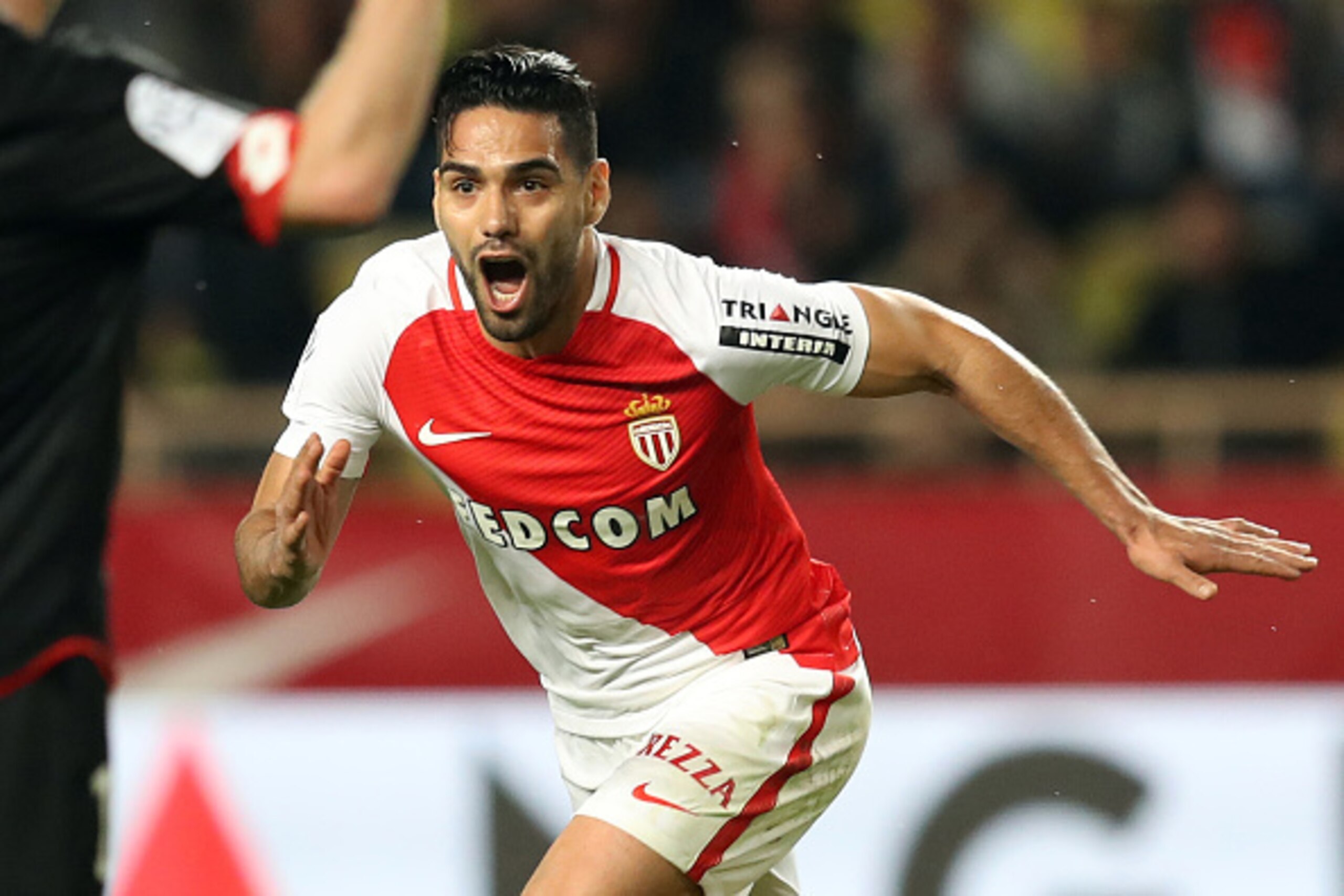Monaco's Colombian forward Radamel Falcao celebrates after scoring a goal during the French L1 football match Monaco (ASM) vs Dijon (DFCO) on April 15, 2017 at the Louis II Stadium in Monaco. / AFP PHOTO / VALERY HACHE        (Photo credit should read VAL