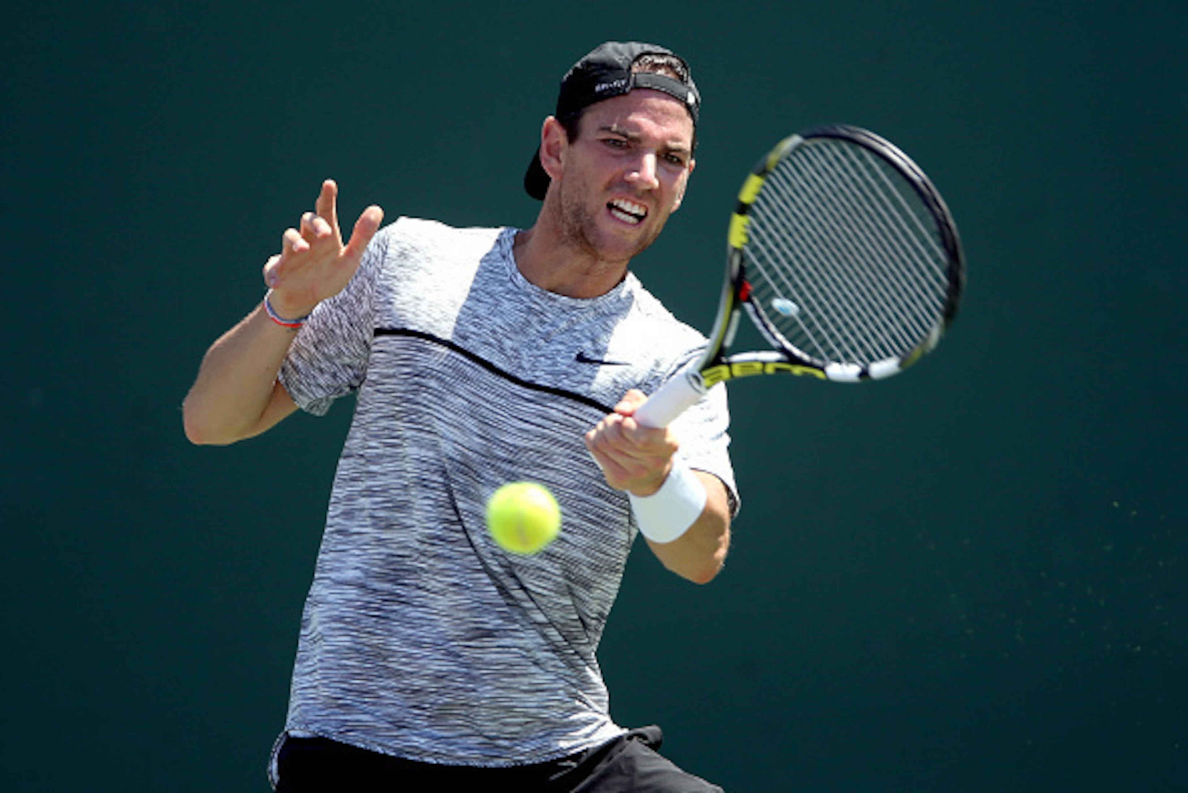 KEY BISCAYNE, FL - MARCH 27: Adrian Mannarino of France returns a shot to Borna Coric of Croatia during the Miami Open at the Crandon Park Tennis Center on March 27, 2017 in Key Biscayne, Florida. (Photo by Matthew Stockman/Getty Images) KEY BISCAYNE, FL - MARCH 27: Adrian Mannarino of France returns a shot to Borna Coric of Croatia during the Miami Open at the Crandon Park Tennis Center on March 27, 2017 in Key Biscayne, Florida. (Photo by Matthew Stockman/Getty Images)