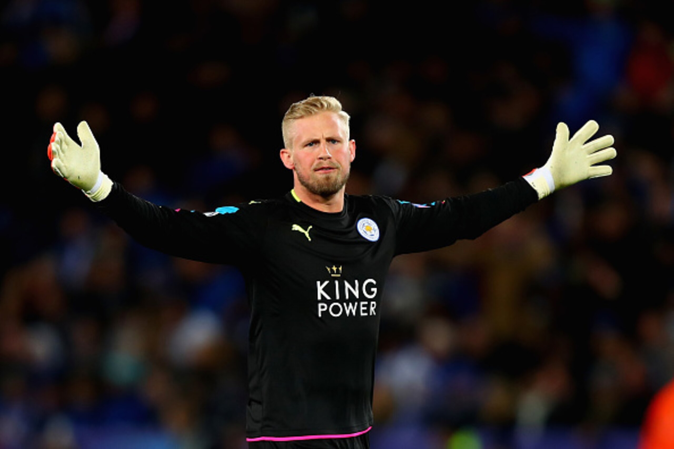 LEICESTER, ENGLAND - APRIL 18: Kasper Schmeichel of Leicester City celebrates after Jamie Vardy of Leicester City (not pictured) scored Leicester City's first goal during the UEFA Champions League Quarter Final second leg match between Leicester City and LEICESTER, ENGLAND - APRIL 18: Kasper Schmeichel of Leicester City celebrates after Jamie Vardy of Leicester City (not pictured) scored Leicester City's first goal during the UEFA Champions League Quarter Final second leg match between Leicester City and