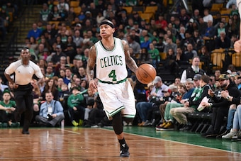 BOSTON, MA - MARCH 26:  Isaiah Thomas #4 of the Boston Celtics handles the ball against the Miami Heat on March 26, 2017 at the TD Garden in Boston, Massachusetts.  NOTE TO USER: User expressly acknowledges and agrees that, by downloading and or using thi