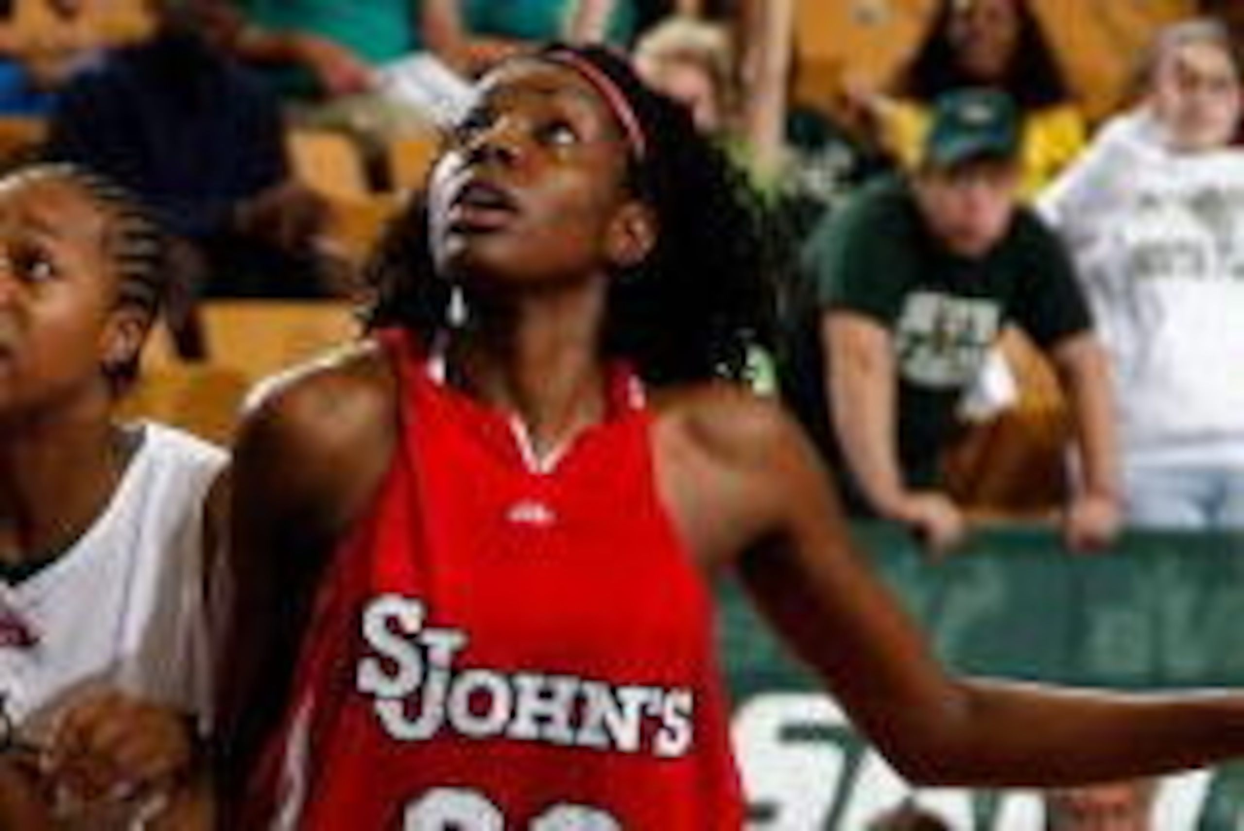 TAMPA, FL - JANUARY 10:  Centhya Hart #30 and Monique McLean #20 of the St. John's Red Storm box out Ashley Sanders #20 the South Florida Bulls during the game at the SunDome on January 10, 2009 in Tampa, Florida.  (Photo by J. Meric/Getty Images)