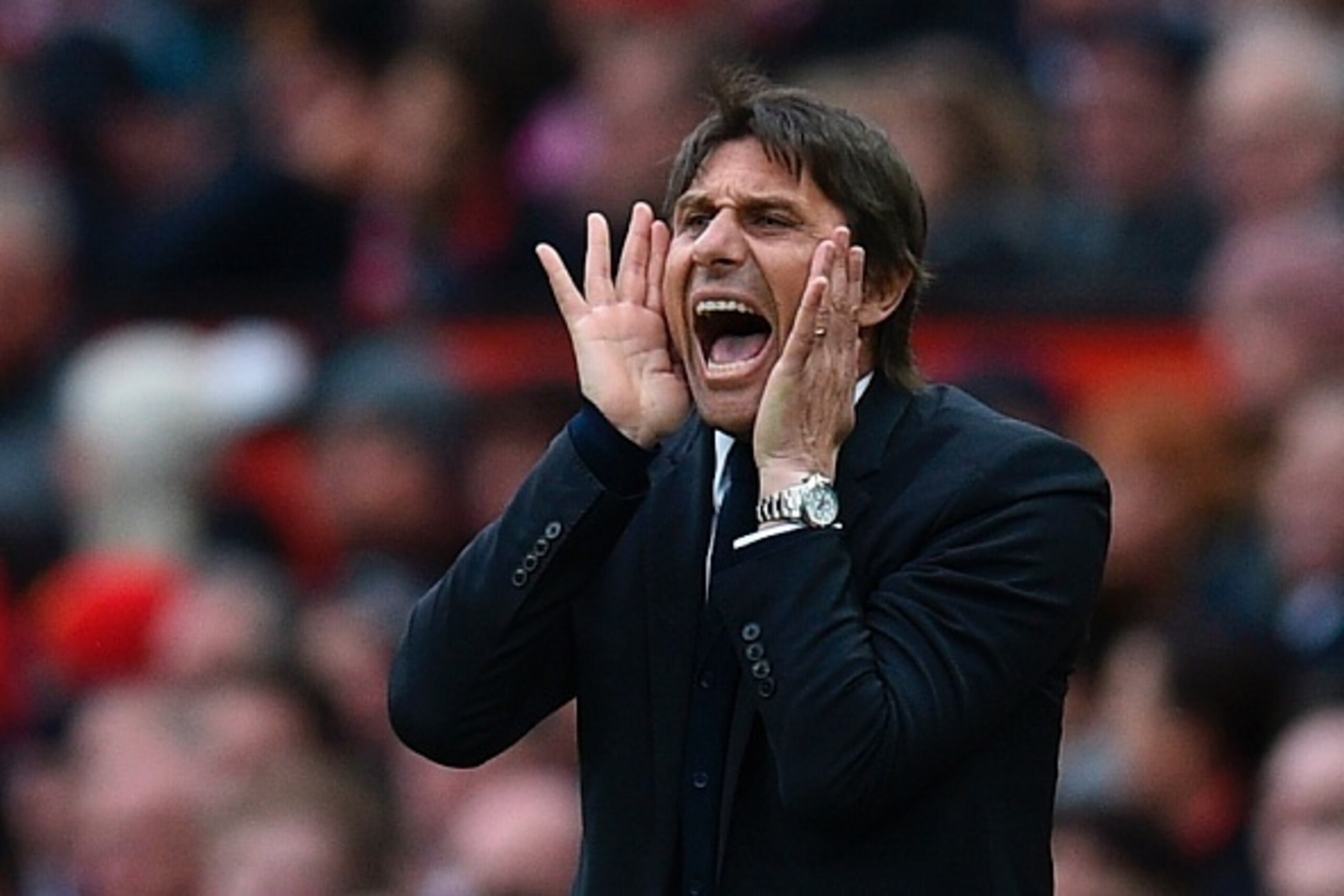 Chelsea's Italian head coach Antonio Conte shouts from the touchline during the English Premier League football match between Manchester United and Chelsea at Old Trafford in Manchester, north west England, on April 16, 2017. / AFP PHOTO / Oli SCARFF / RE