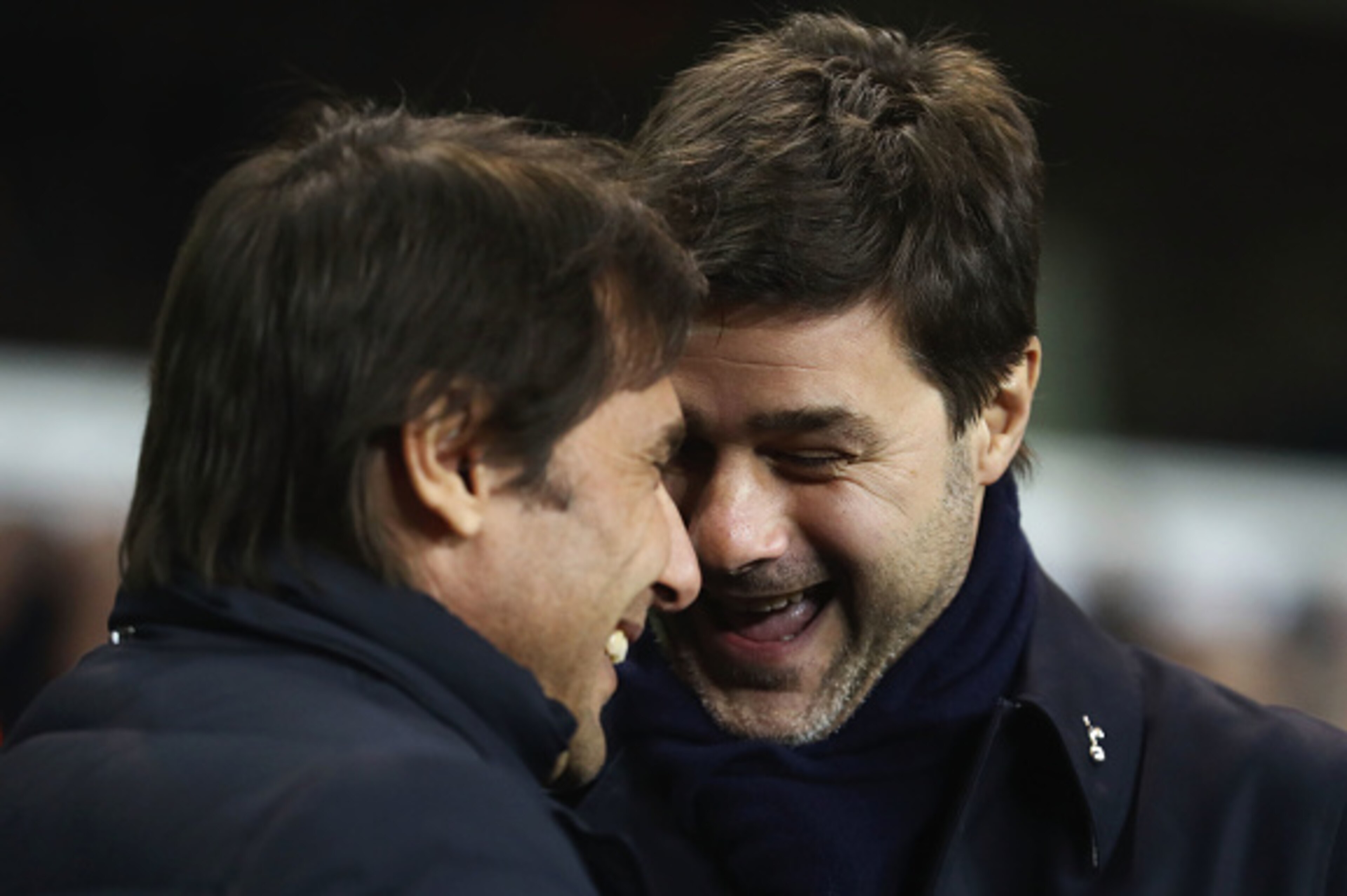 LONDON, ENGLAND - JANUARY 04:  Antonio Conte, Manager of Chelsea (L) and Mauriio Pochettino, Manager of Tottenham Hotspur (R) speak prior to the Premier League match between Tottenham Hotspur and Chelsea at White Hart Lane on January 4, 2017 in London, En