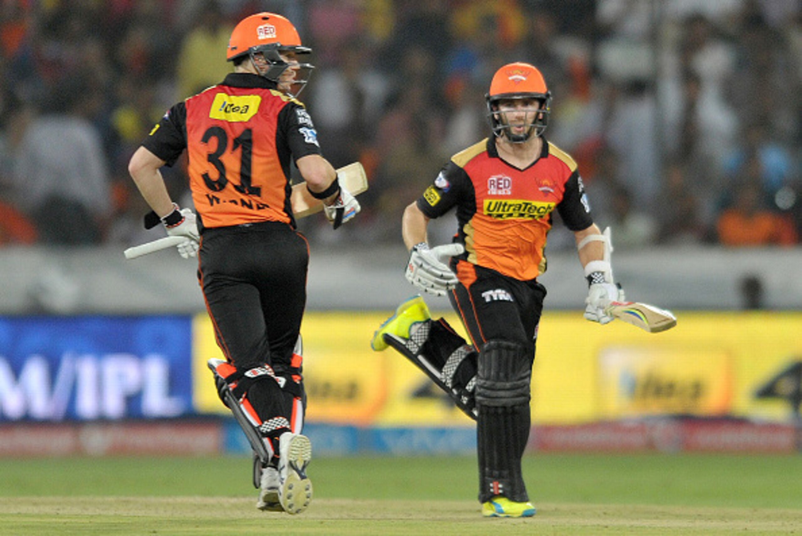 Sunrisers Hyderabad captain David Warner (L) and Kane Williamson run between the wickets during the 2016 Indian Premier League (IPL) Twenty20 cricket match between Sunrisers Hyderabad and Royal Challengers Bangalore at The Rajiv Gandhi International Stadi