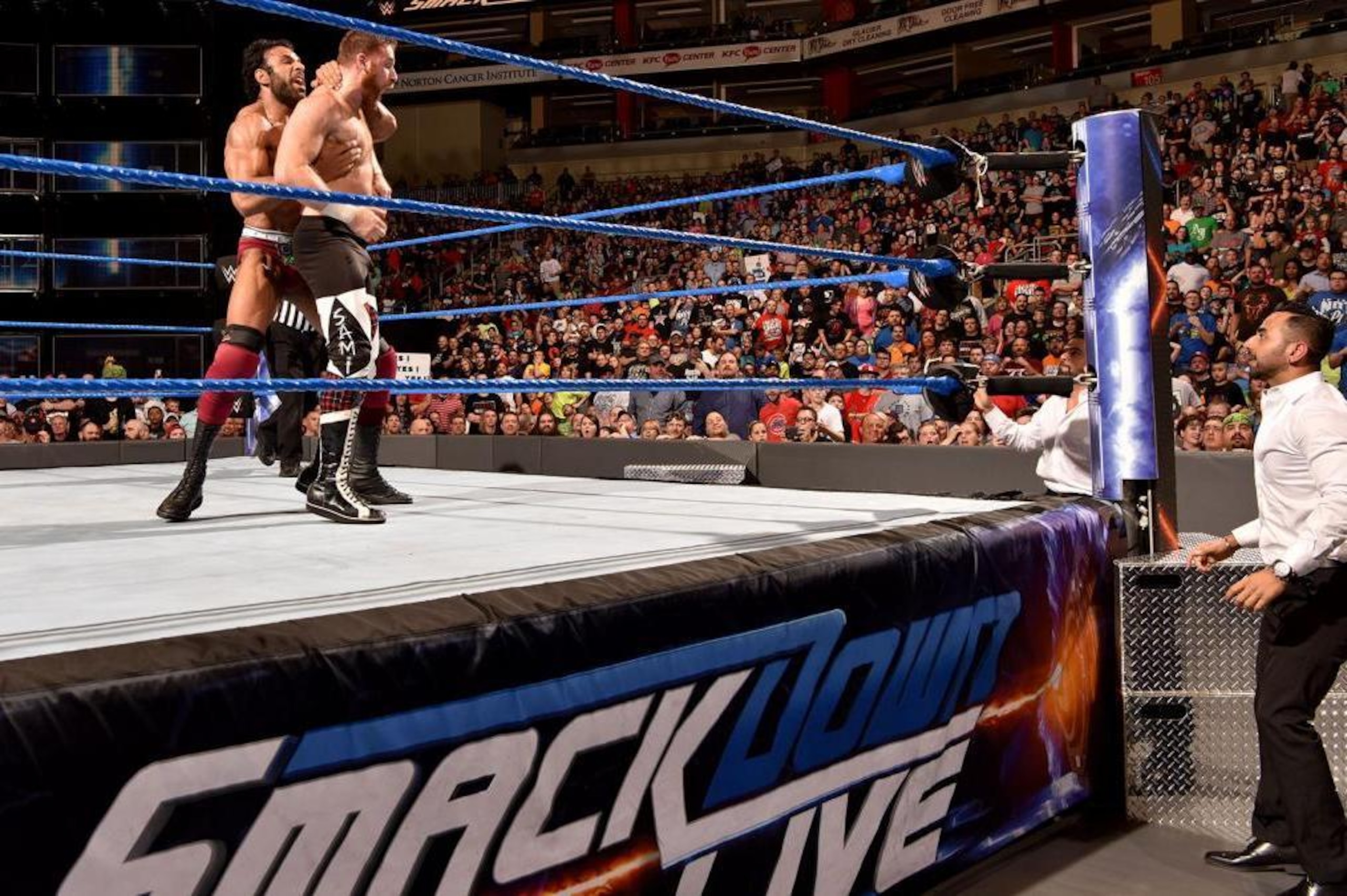 Jinder Mahal grabs Sami Zayn from behind during Tuesday's SmackDown. Jinder Mahal grabs Sami Zayn from behind during Tuesday's SmackDown.