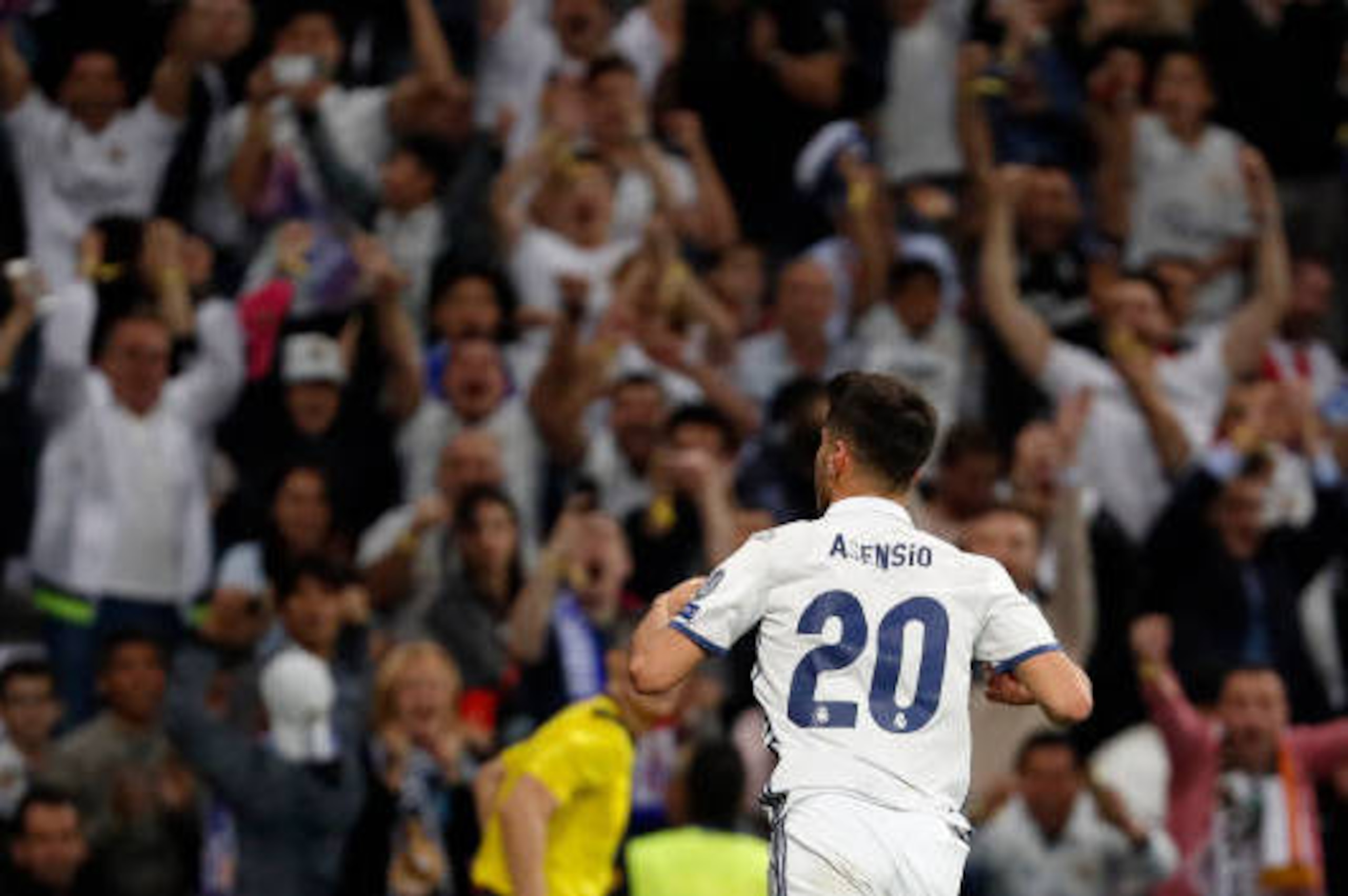 MADRID, SPAIN - APRIL 18: Marco Asensio of Real Madrid celebrates after scoring a goal during the UEFA Champions League Quarter Final second leg match between Real Madrid CF and FC Bayern Muenchen at Estadio Santiago Bernabeu on April 18, 2017 in Madrid, 