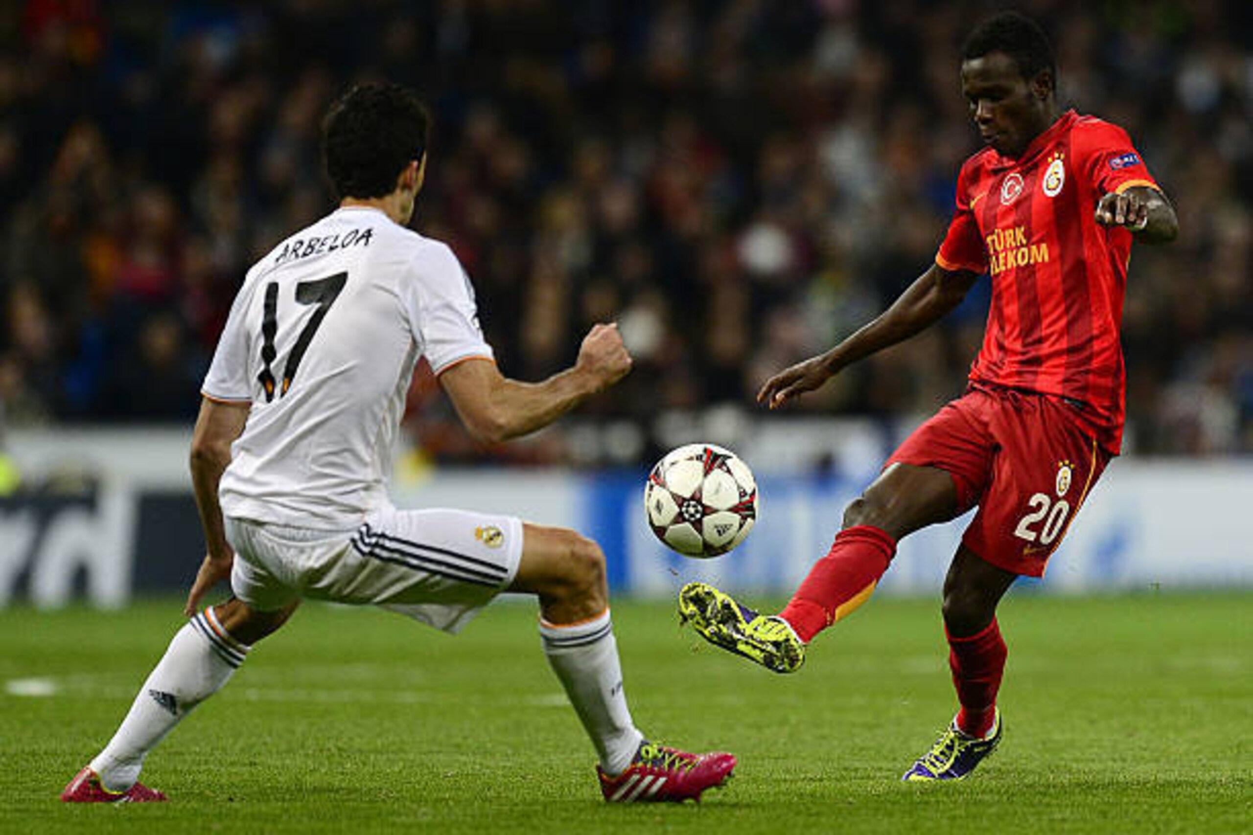 Galatasaray's Portuguese midfielder Bruma (R) vies with Real Madrid's defender Alvaro Arbeloa during the UEFA Champions League football match Real Madrid CF vs Galatasaray SK at the Santiago Bernabeu stadium in Madrid on November 27, 2013. AFP PHOTO/ JAV Galatasaray's Portuguese midfielder Bruma (R) vies with Real Madrid's defender Alvaro Arbeloa during the UEFA Champions League football match Real Madrid CF vs Galatasaray SK at the Santiago Bernabeu stadium in Madrid on November 27, 2013. AFP PHOTO/ JAV