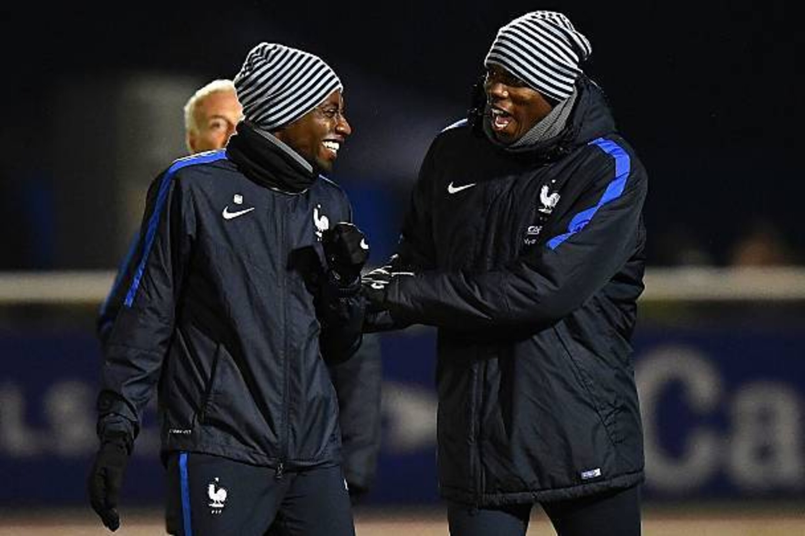France's midfielder Blaise Matuidi (L) jokes with France's midfielder Paul Pogba during a training session in Clairefontaine-en-Yvelines, near Paris, on November 7, 2016, as part of the team's preparation for the upcoming World Cup 2018 qualifiers. 
With 